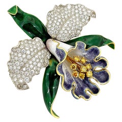 Spilla Orchidea Oscar Heyman in platino e oro 18KT con diamante giallo e bianco fantasia