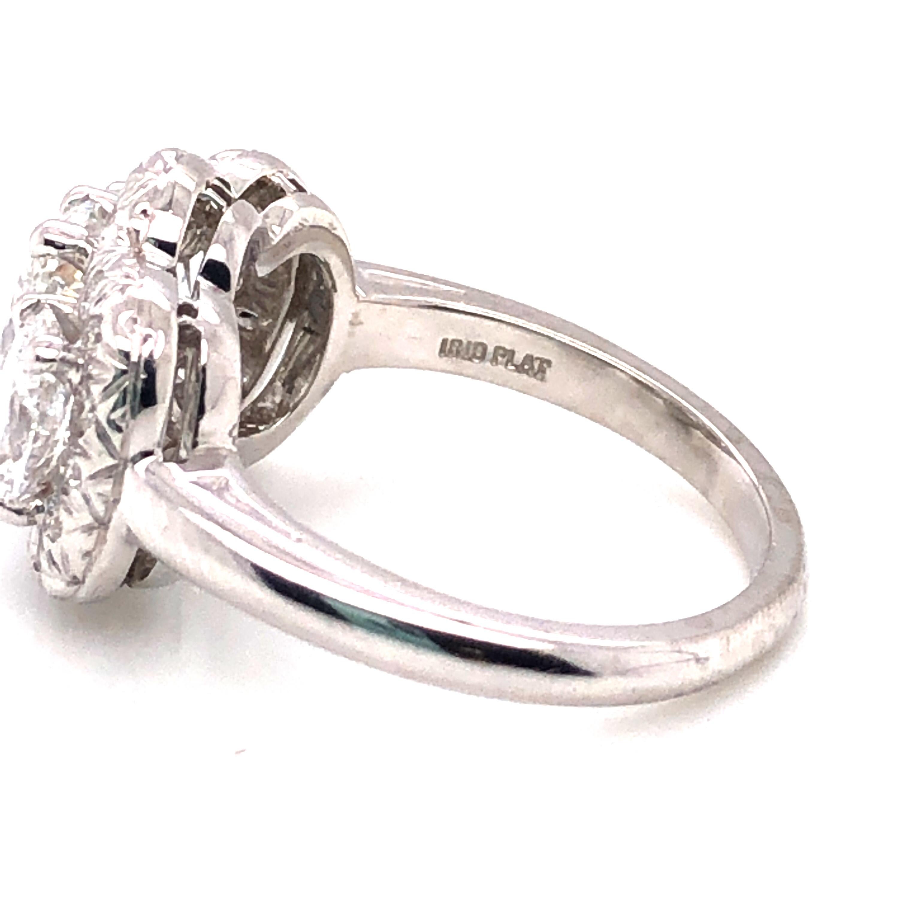 Oval Cut Oscar Heyman Platinum GIA Certified Oval Diamond with Halo Three-Stone Ring For Sale