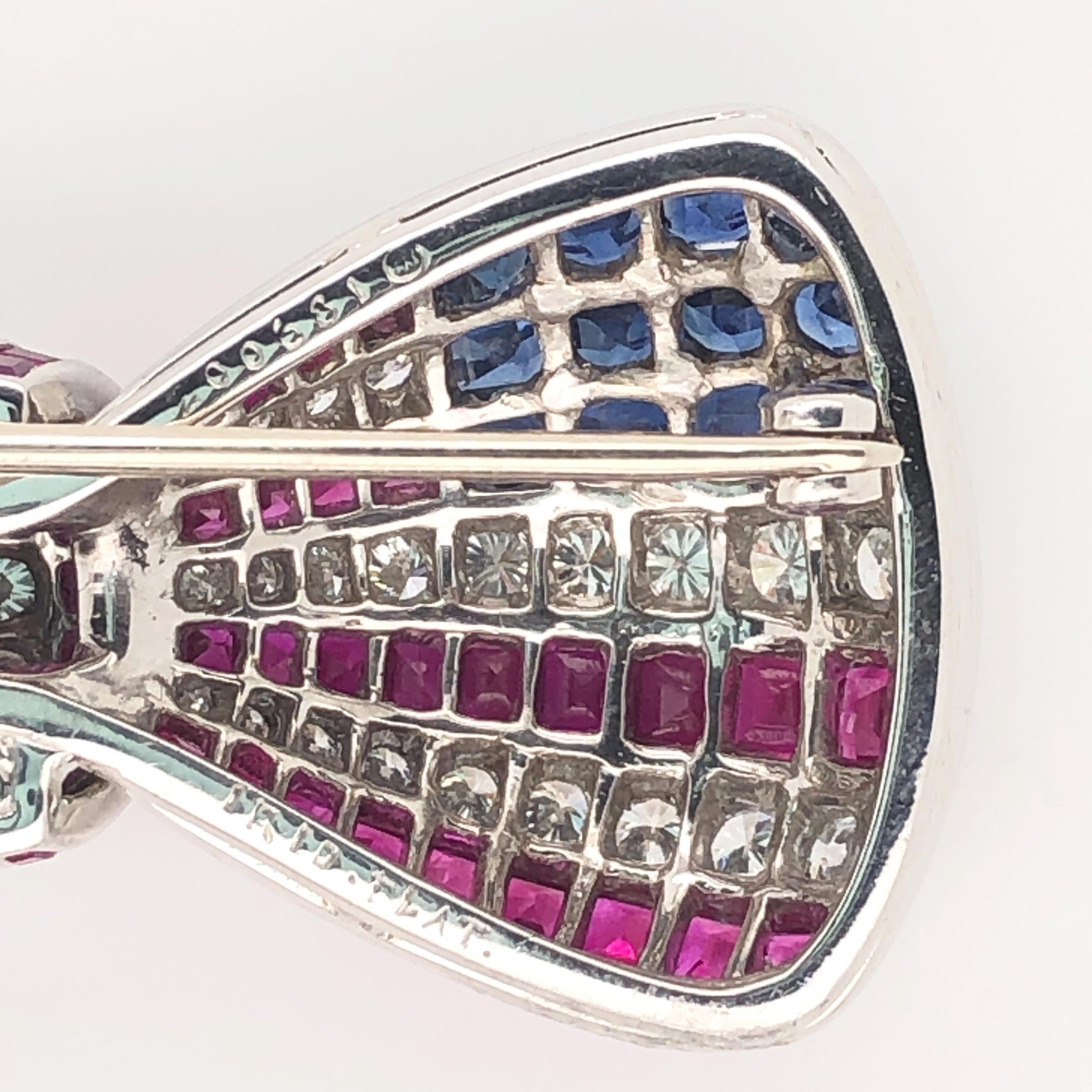 Oscar Heyman platinum American flag brooch contains rubies (6.01cts), sapphires (1.54cts) and diamonds (1.71cts). It is stamped with the makers mark, IRID PLAT, and serial number 200681.

Custom hand engraving available by request. Complimentary up