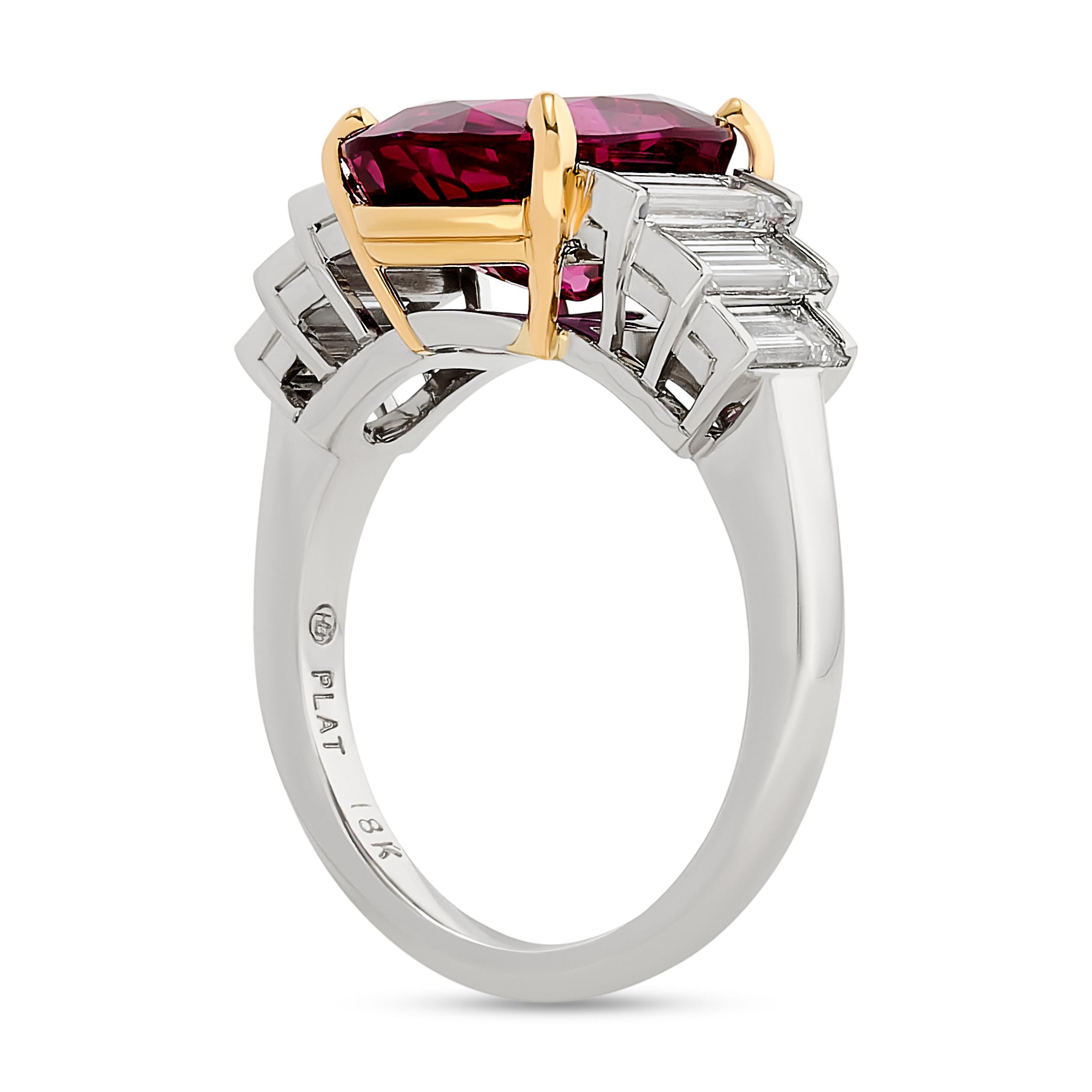 This Oscar Heyman ruby and diamond ring is a masterpiece of craftsmanship and luxury - blend of bright rubies and brilliant diamonds.

This ring features one GIA certified 4.84 carat cushion Thai headed ruby and 6 baguette diamonds totaling