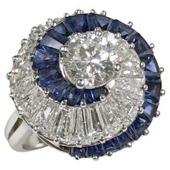 Oscar Heyman Anillo Remolino Clásico Platino Diamante y Zafiro