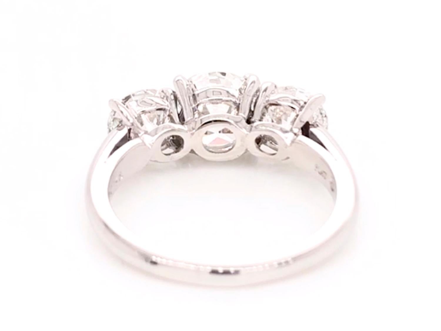 Contemporary Oscar Heyman Platinum GIA Certified Round Diamond Three-Stone Engagement Ring