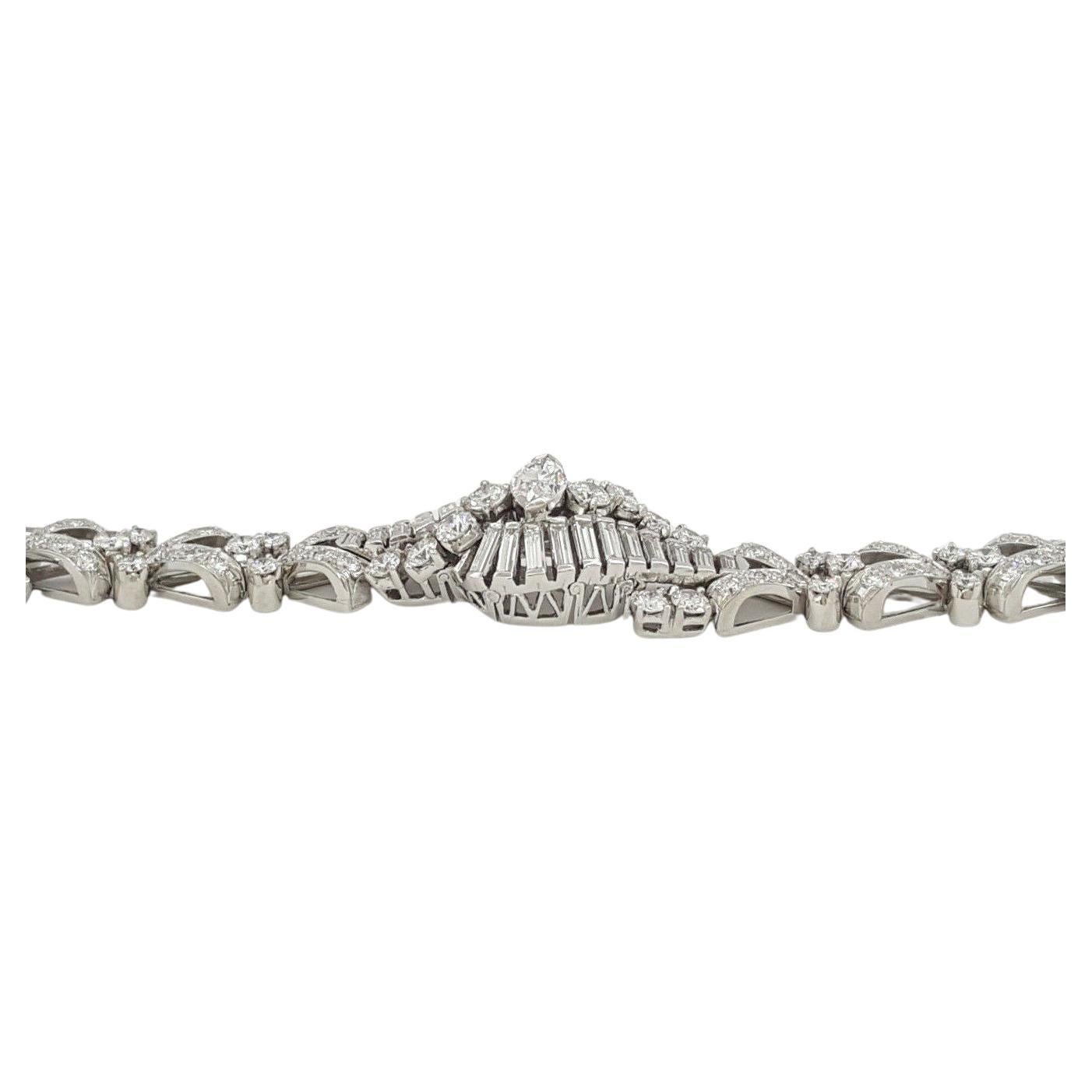 Oscar Heyman Brothers 7.70 carst 

Marquise, Baguette & Round Brilliant Cut Diamond Bracelet. 
