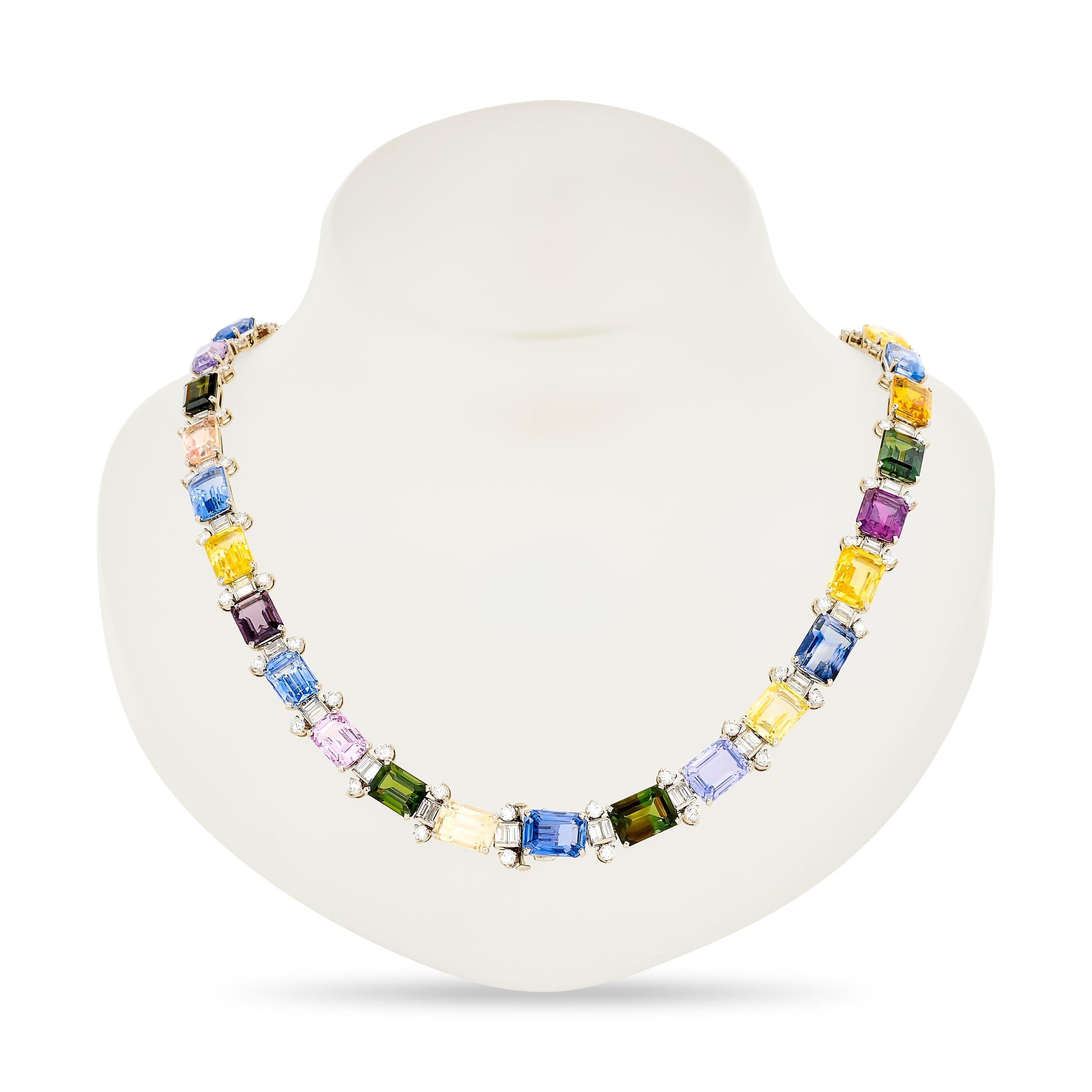 Oscar Heyman's exquisite masterpiece, a necklace with an array of multi-color sapphires (and 1 spinel) adorned with diamonds. This piece transforms into three magnificent bracelets, each radiating their own unique charm.

Details:
20 emerald cut