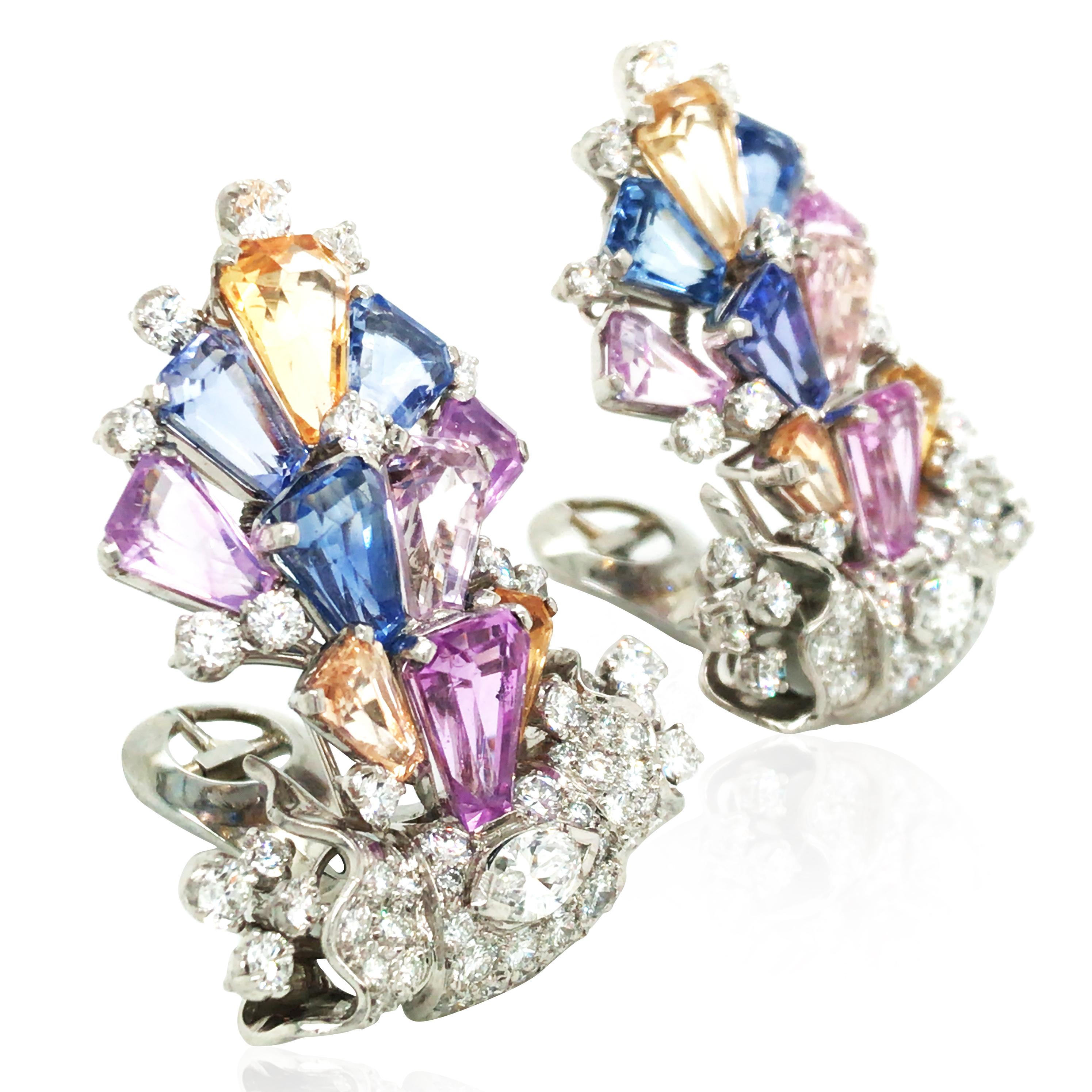 These earrings are carfted in platinum. Accompanied by an Oscar Heyman certificate stating that these earrings contain 20 kite multicolor sapphires and 106 round-cut and 2 Marquise-cut diamonds. Sapphire approx. 24.4ct in total and diamond approx.