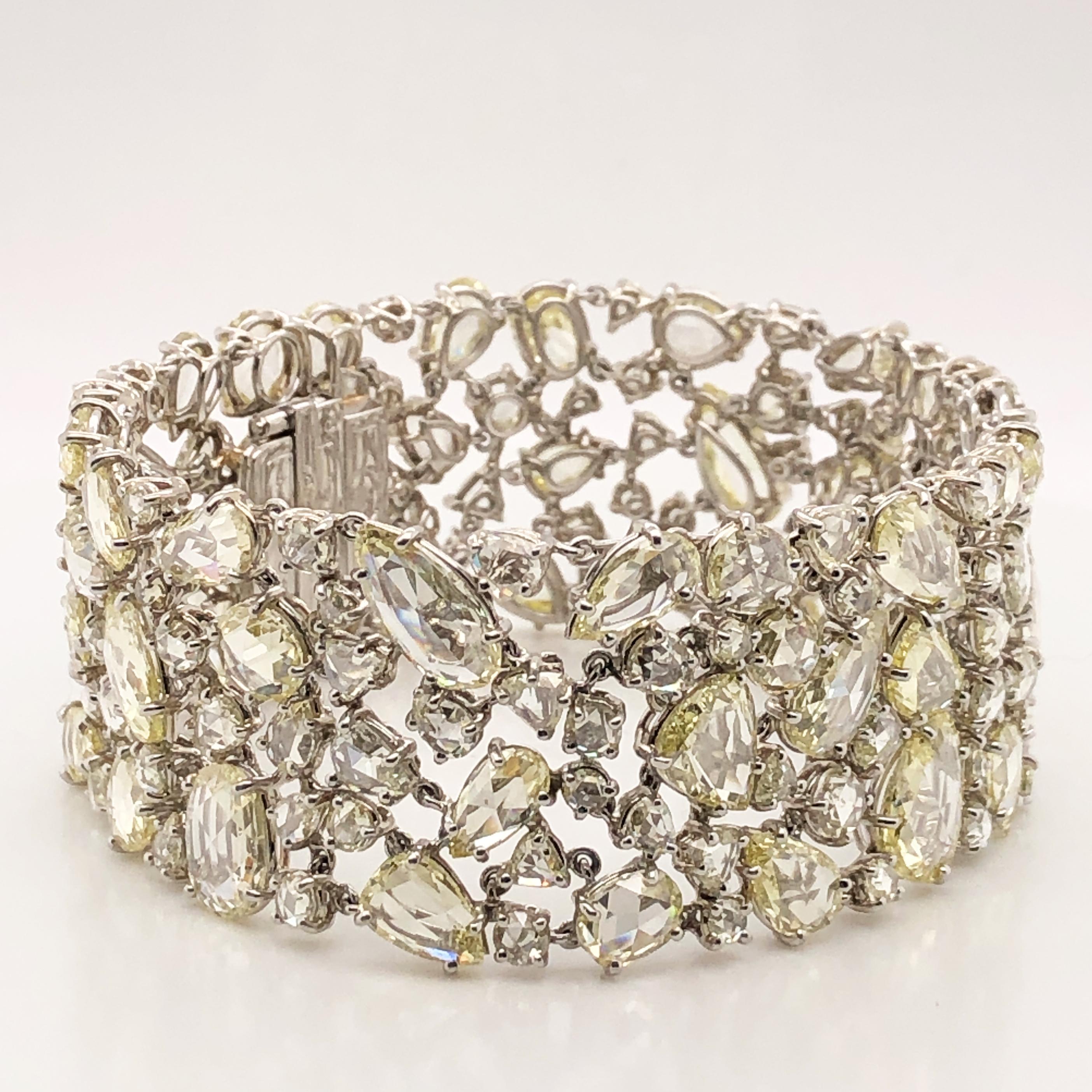 Oscar Heyman platinum bracelet with 156 Rose Cut Diamonds weighing 47.65cts. It is stamped with the makers mark, IRID PLAT, and serial number 804509.

The bracelet measures 7'' in length and 1'' in width, and has a hidden box clasp with a