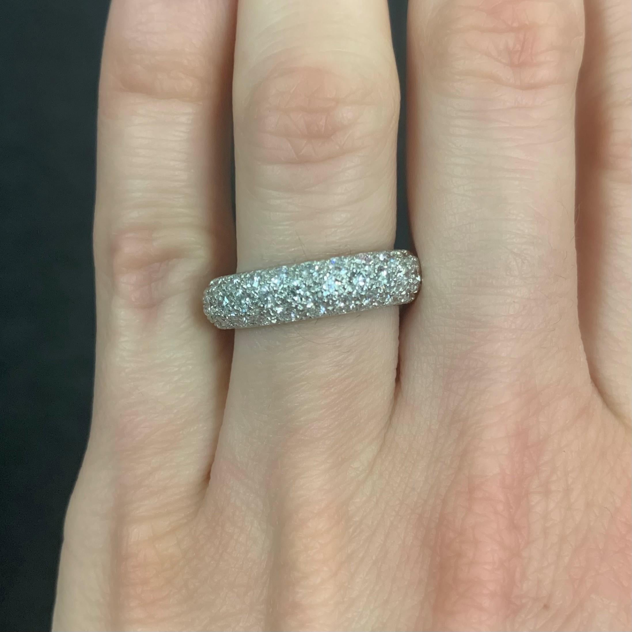 Oscar Heyman platinum rounded diamond band ring contains 72 Round Diamonds (F-G/ VS+ quality) weighing 2.41cts that are bead set. The diamonds extend around the whole ring. The ring is 5mm wide, sits 2.5mm off the finger, and is stamped with the