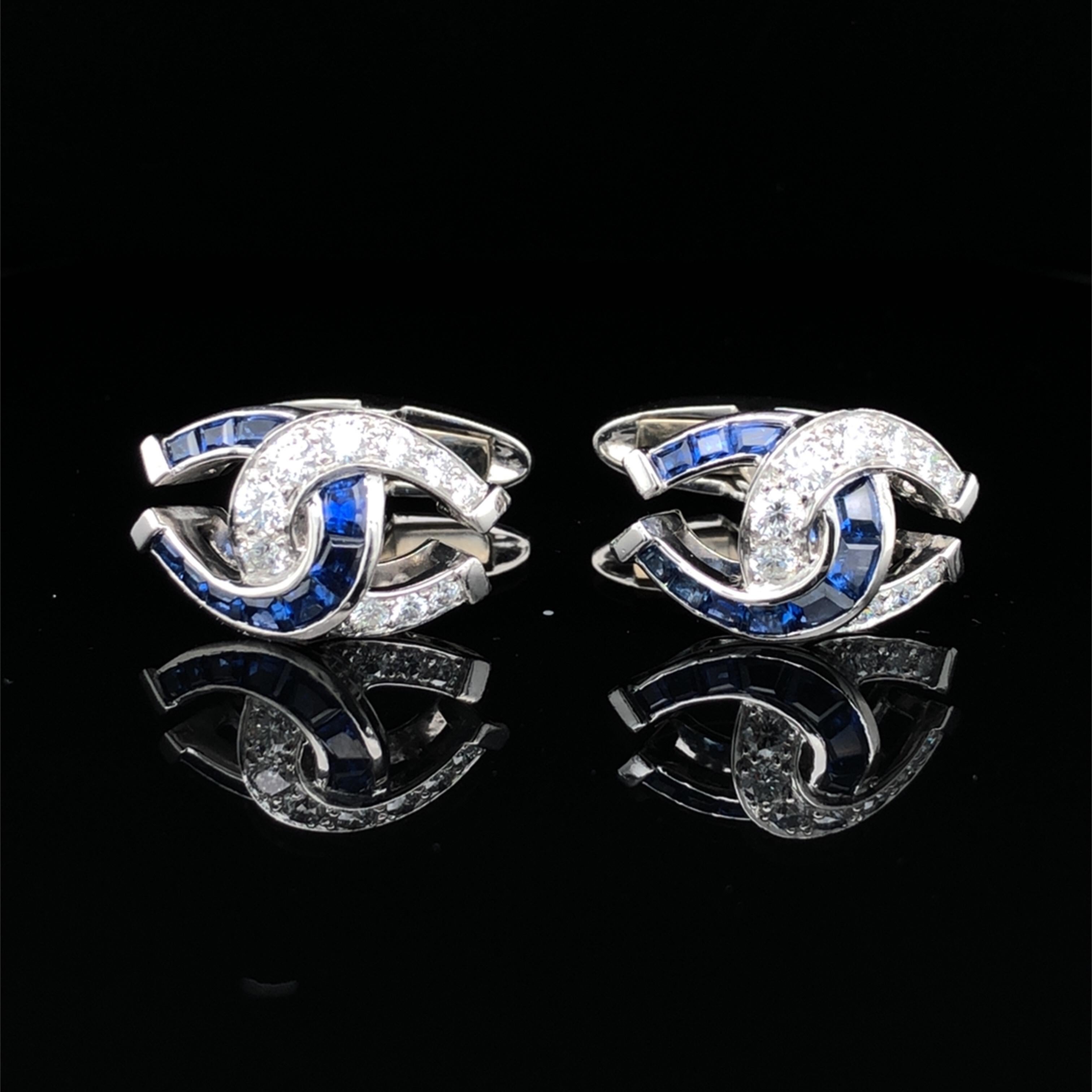 These Oscar Heyman horseshoe cufflinks are made in platinum and set with 20 square sapphires (1.79cts) and 20 round diamonds (0.90cts, F-G/ VS). The sapphires are cut by hand at Oscar Heyman's Madison Avenue workshop in New York City by our
