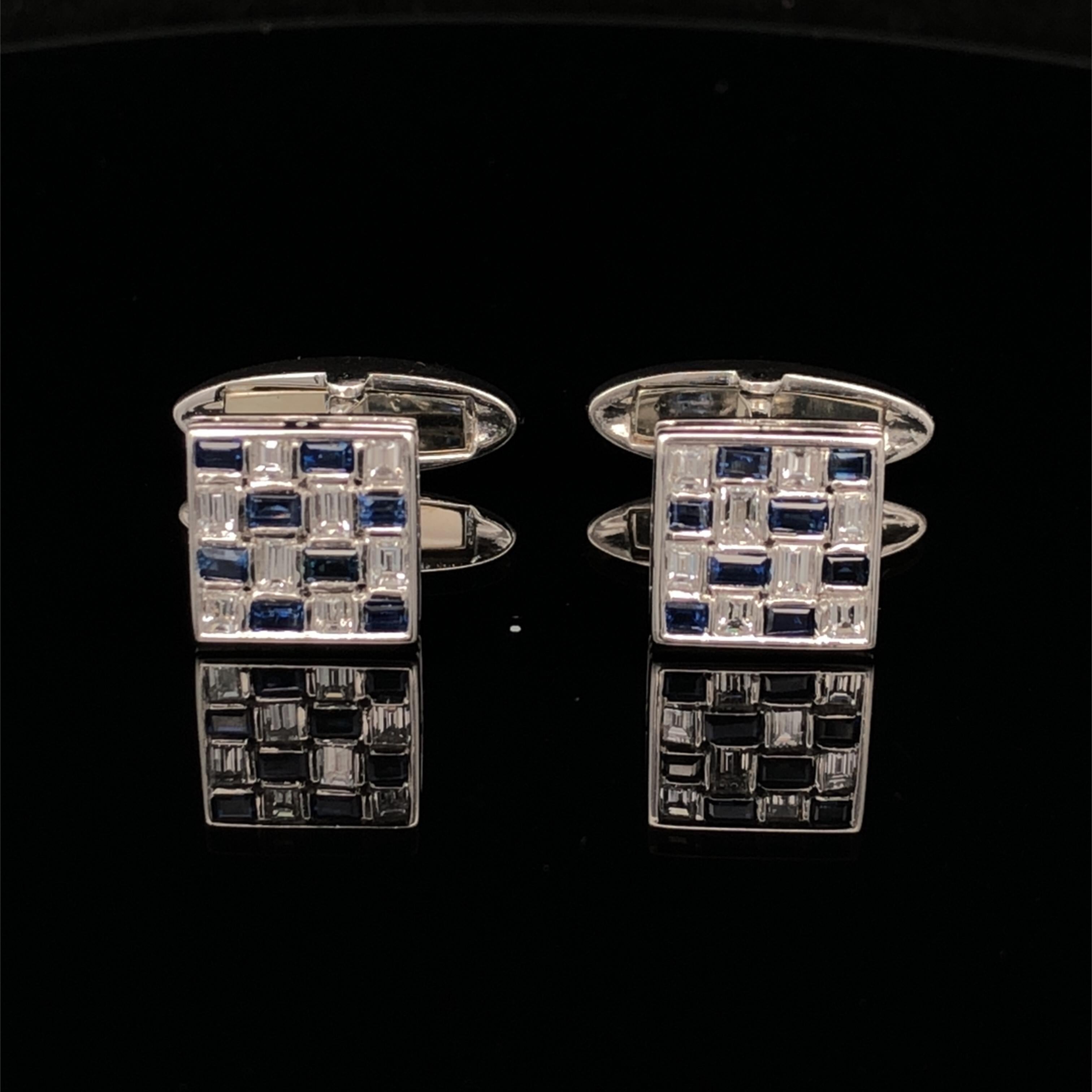 Oscar Heyman platinum cufflinks contain 16 baguette diamonds weighing 1.00tcw and 18 baguette diamonds weighing 0.88tcw set in a woven motif. These elegant cufflinks measure 10mm x 10mm with a total depth (including the back plate) of 21mm. They are