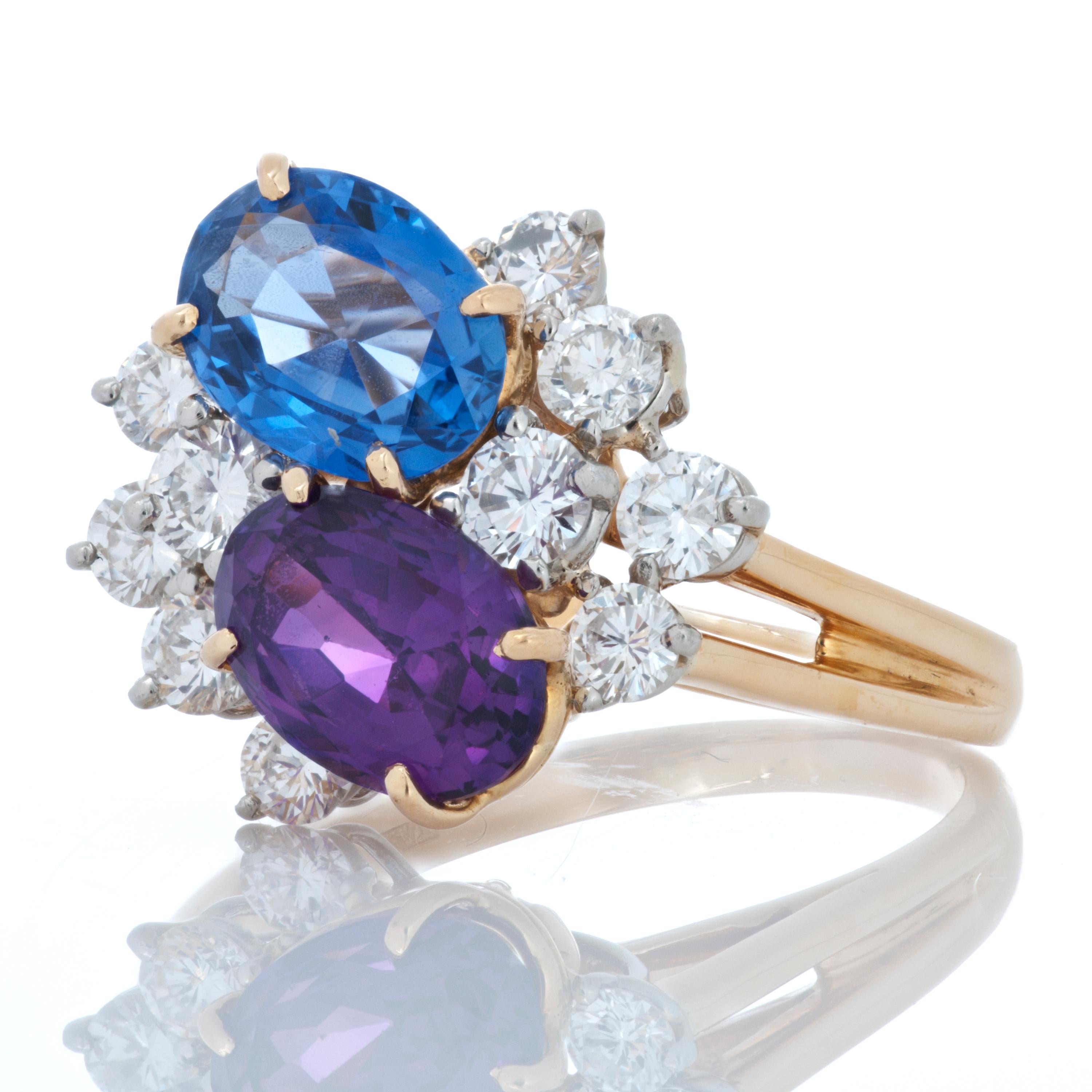 Oscar Heyman purple sapphire, blue sapphire and diamond twin ring in two-tone 18k yellow gold and platinum.  

This Oscar Heyman ring features one GIA certified 2.08 carat oval blue unheated Sri Lankan sapphire, one GIA certified 2.22 carat oval