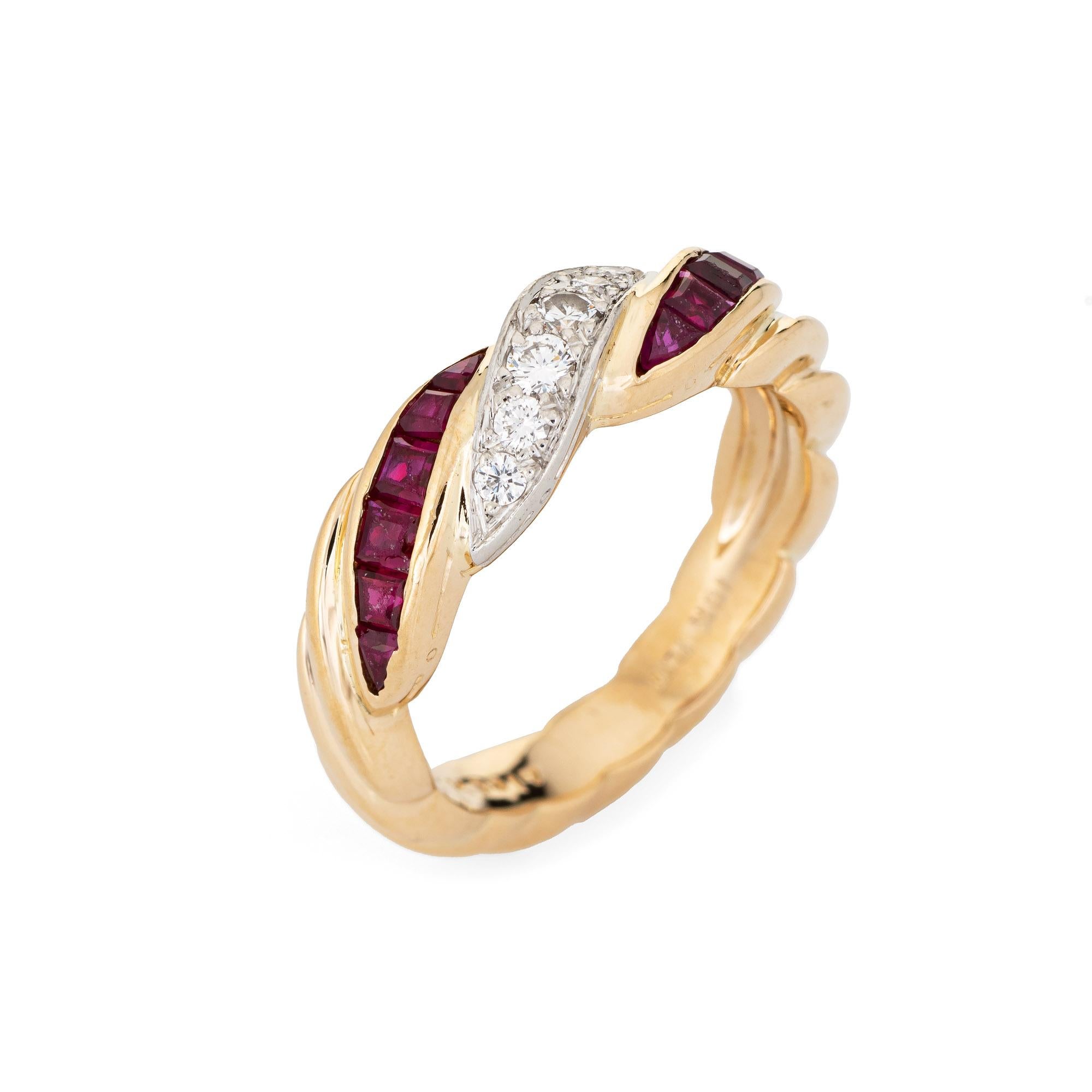 Stylish vintage Oscar Heyman diamond & ruby ring crafted in 18 karat yellow gold and platinum. 

Six round brilliant cut diamonds total an estimated 0.20 carats (estimated at F-G color and VVS2 clarity). Twelve square cut rubies total an estimated
