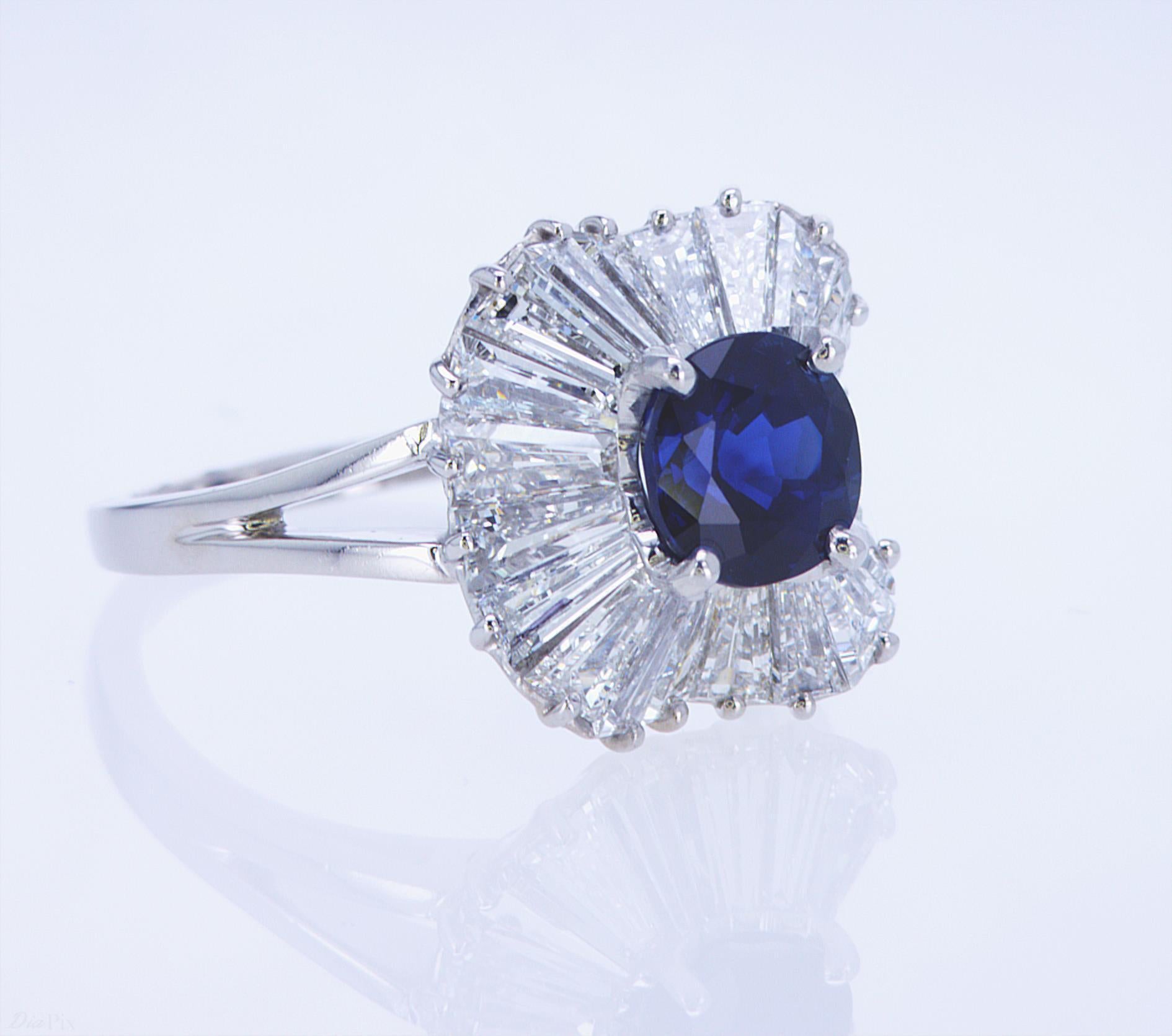 Platinum Ballerina Sapphire and Diamond Ring by Oscar Heyman, circa 1974. 1.99ct Sapphire, 20 Tapered Baguettes weighing 2.58ct TW.