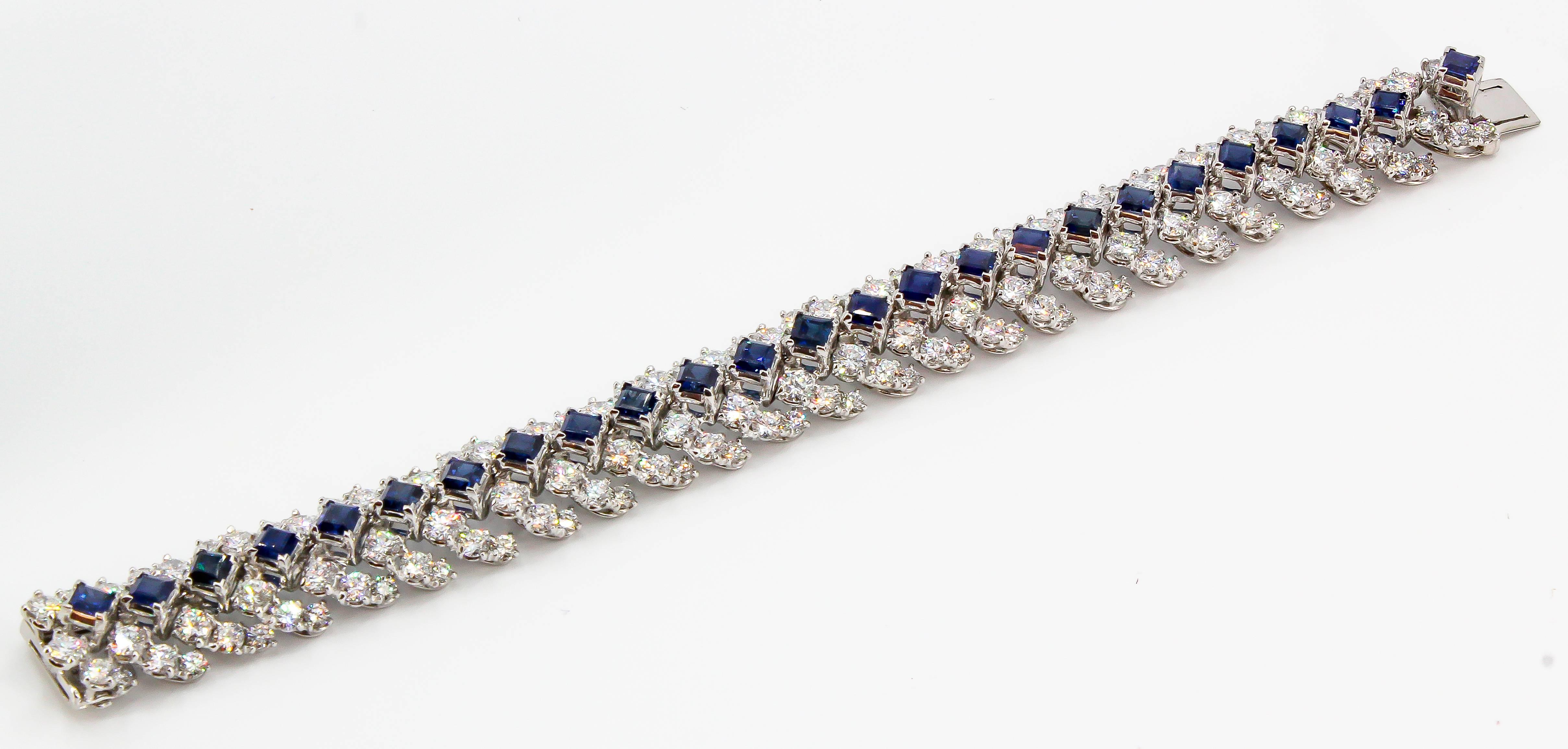 Elegant blue sapphire, diamond and platinum flexible 5 row bracelet by Oscar Heyman, circa 1965. It features rich square cut blue sapphires in the middle row, approx. 9 carats , surrounded by high grade round brilliant cut diamonds throughout,