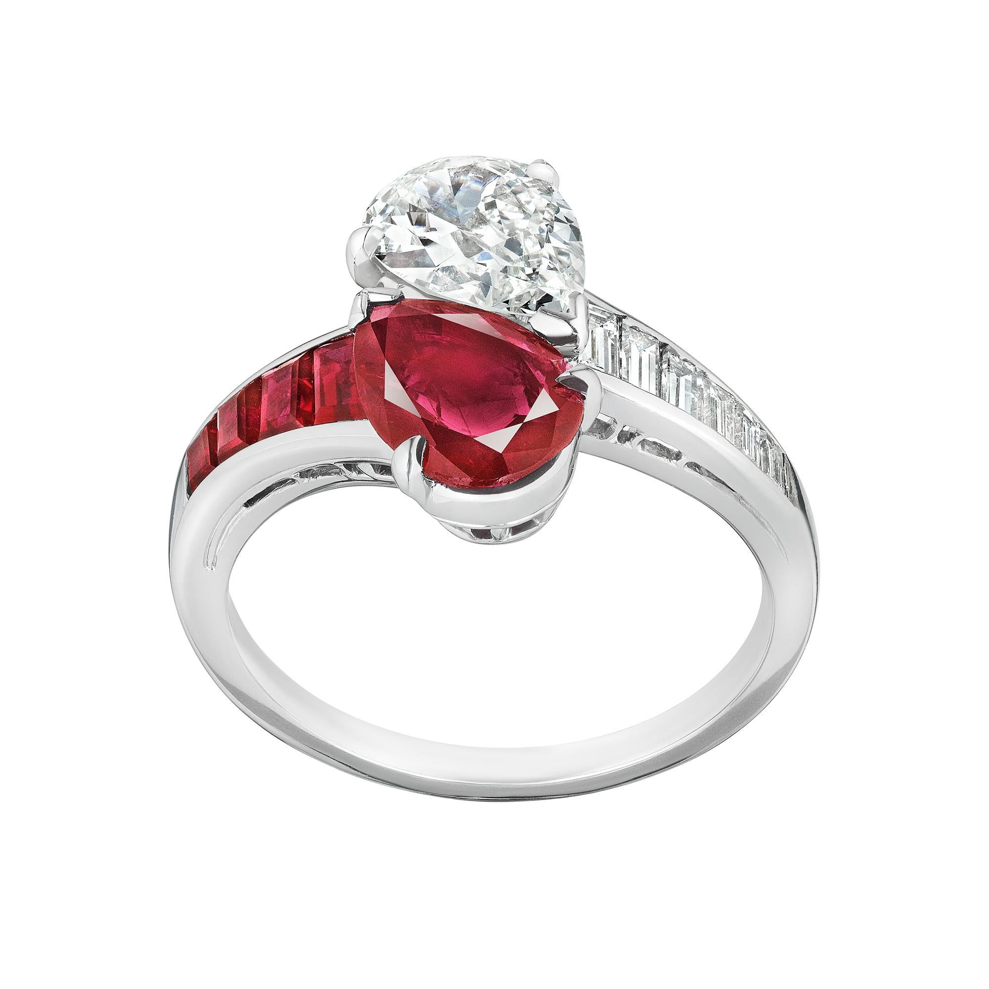 Symbolizing the commitment of you and me, translated to French as 'Toi et Moi', this Oscar Heyman vintage ruby and diamond bypass ring is timelessly romantic.  With a .95 carat pear shape natural Burmese AGL certified luscious ruby happily snuggling