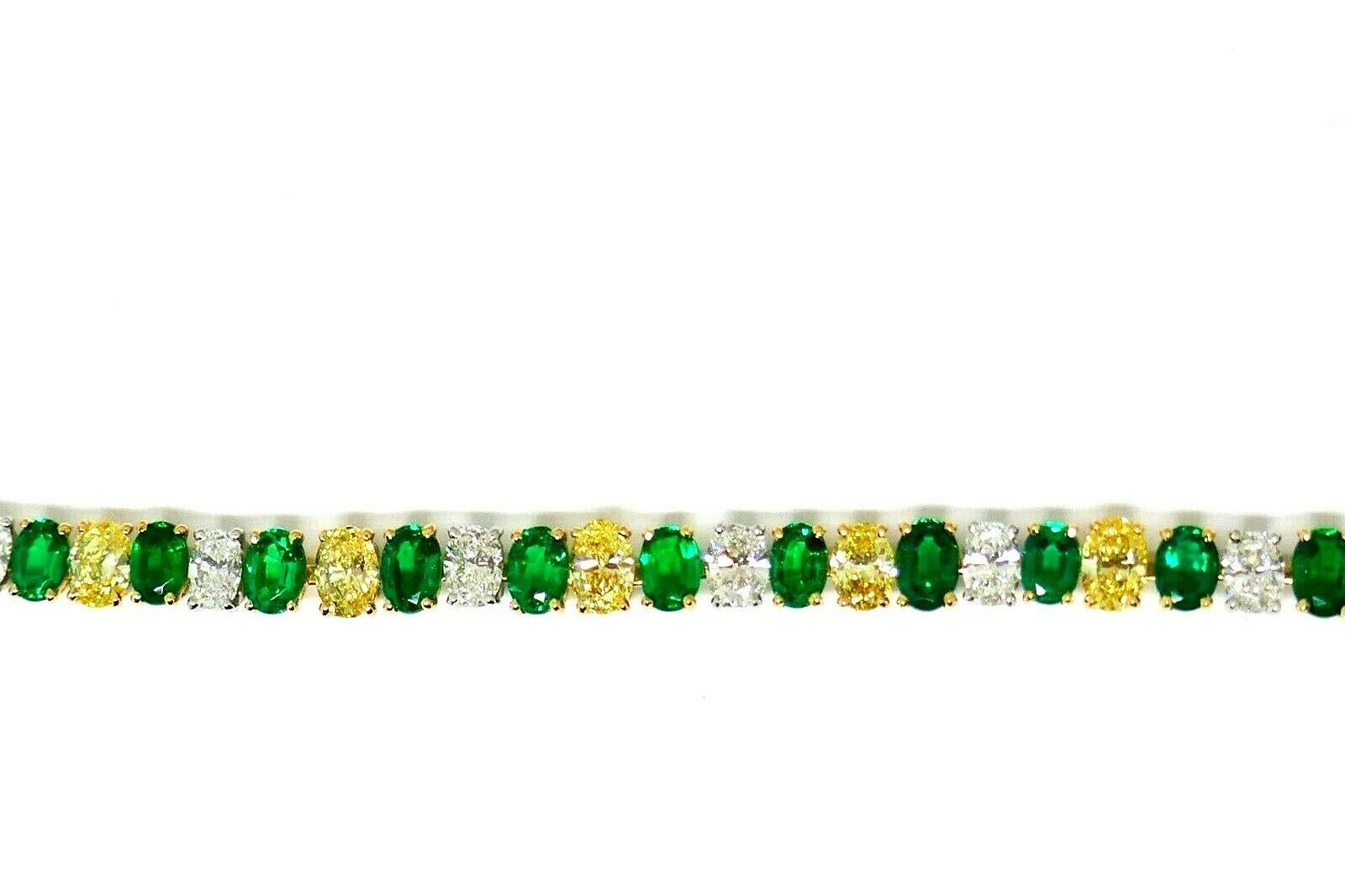 An exquisite vintage (c. 1960s) tennis bracelet by Oscar Heyman. Made of 18k yellow gold and platinum, features canary and white oval cut diamonds and oval emeralds. Comes with a certificate of authenticity. 
Stamped with Oscar Heyman maker's mark,