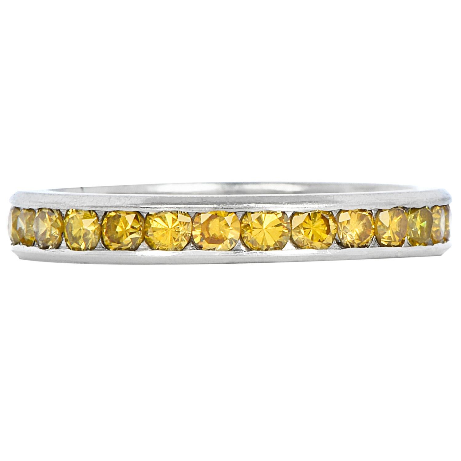 Vintage Oscar Heyman Eternity natural Vivid diamond Diamond band ring with a sparkly glistening look.

This classic band is crafted in solid Platinum, weighing approximately 3.5 grams.

It features approx 30 Genuine dazzlings of natural vivid yellow