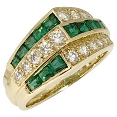Anello Oscar Heyman in oro giallo con diamanti e smeraldi