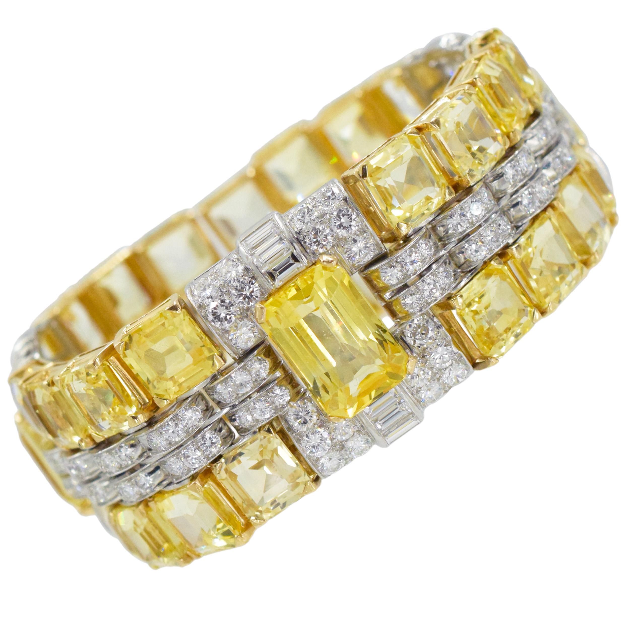 Oscar Heyman Yellow Sapphire And
Diamond Bracelet In platinum and 18k gold. Circa 1950. This beautiful bracelet showcases an array of yellow sapphires and diamonds. There is total of three emerald cut yellow sapphires, with total weight of 27.00ct,
