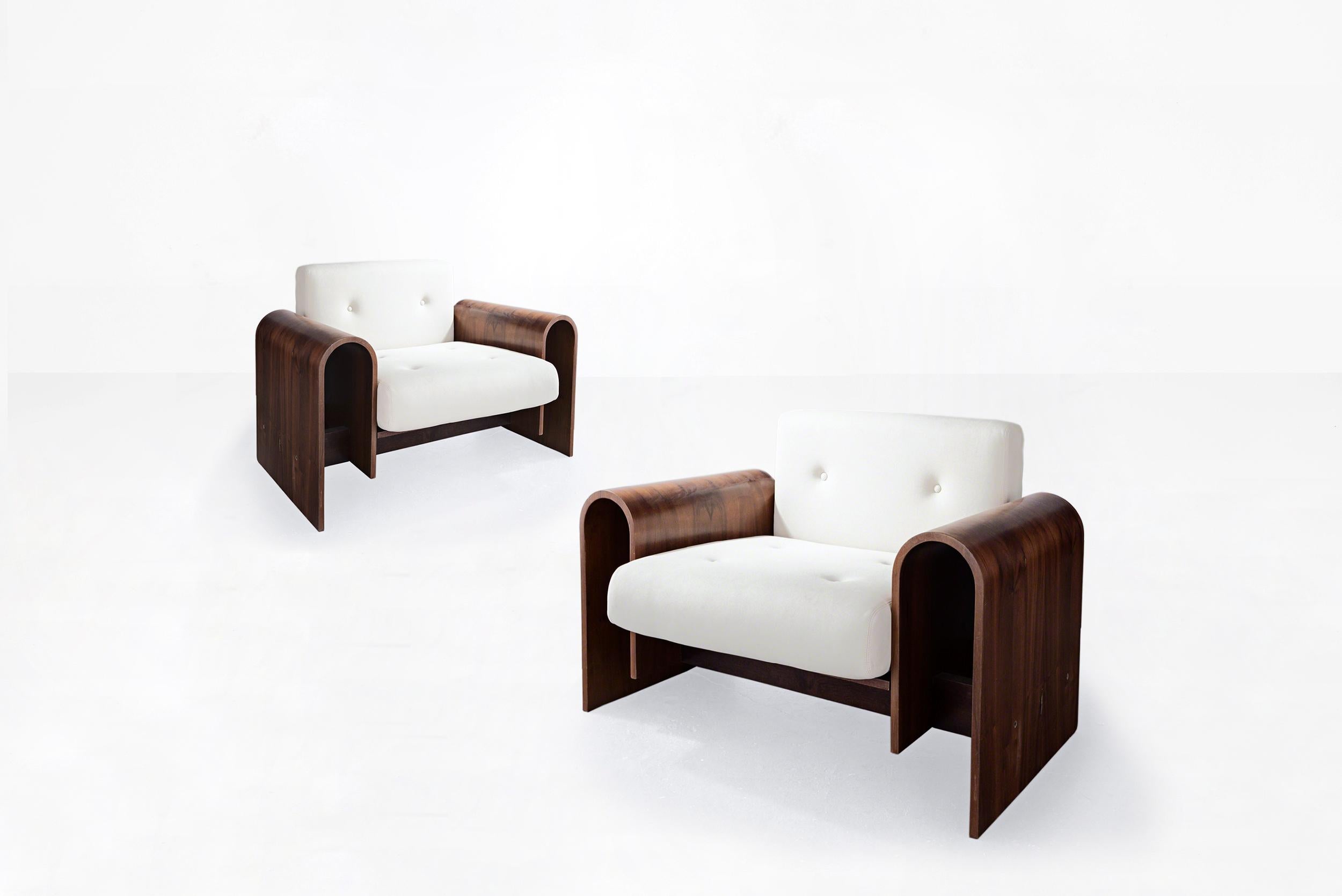 Oscar Niemeyer
Pair of armchairs model “ON”
Manufactured for SESC Hotel
Brazil, 1990
Imbuia wood, wool upholstery
From the archives of Side Gallery, Barcelona 

Measurements
100 cm x 85 cm x 70 H cm
39.37 in x 33.46 in x 27.55 H