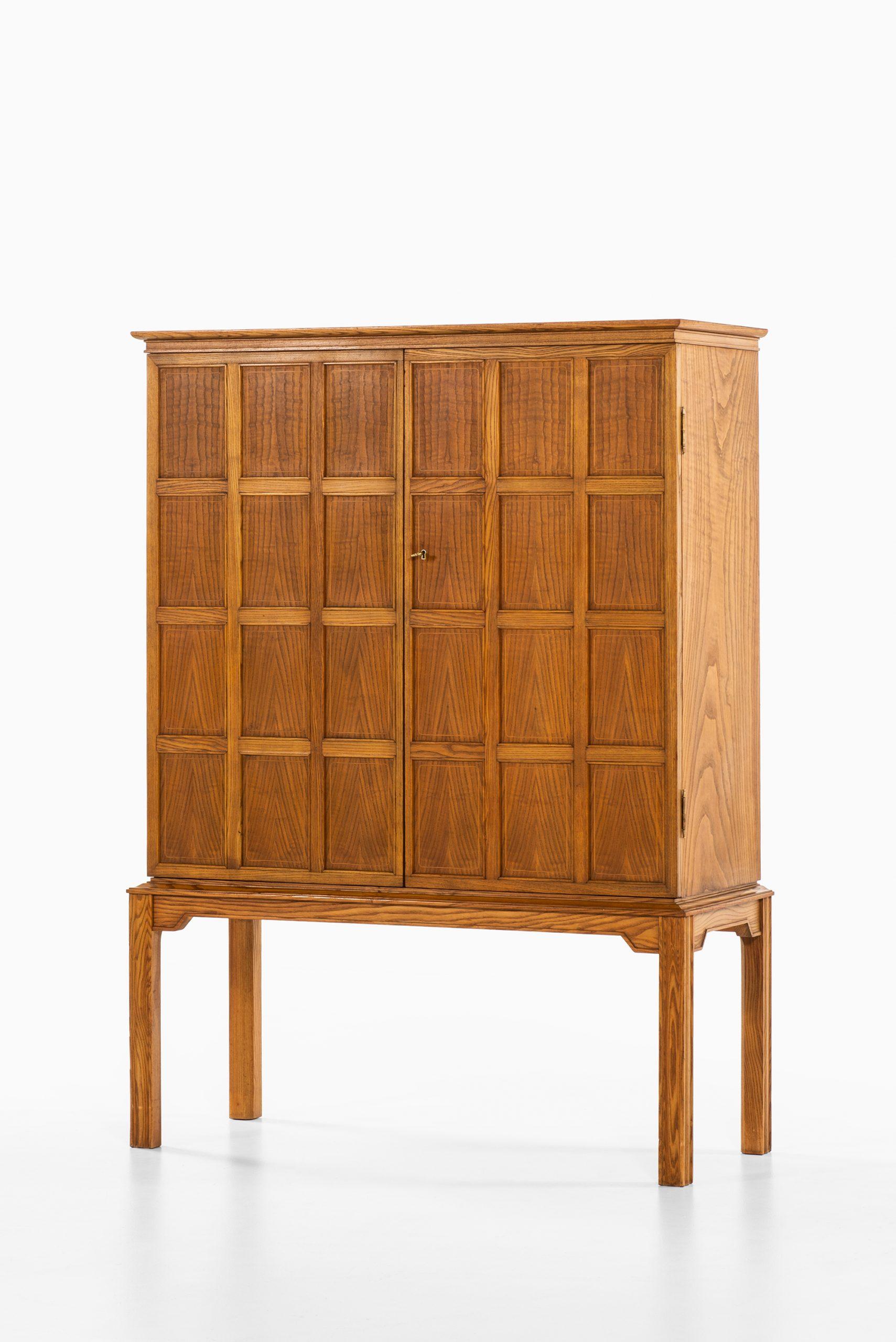 Very rare cabinet designed by Oscar Nilsson. Produced in Sweden.