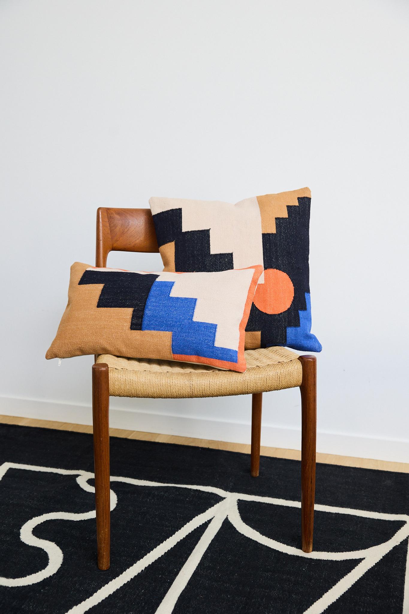 This geometric throw pillow has been ethically hand woven by artisans in Rajasthan, India, using a traditional weaving technique which is native to this region.

The purchase of this handcrafted pillow helps to support the artisans and preserve