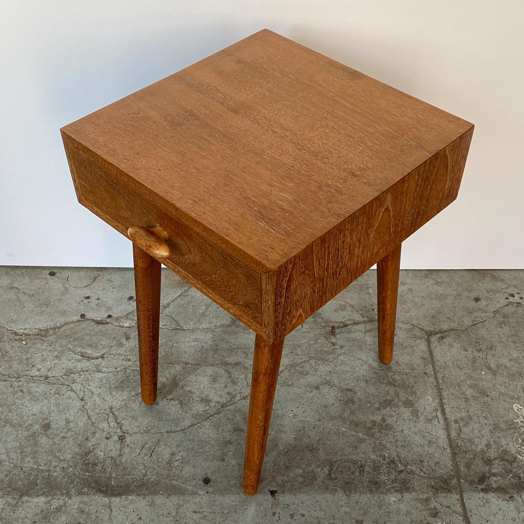 Nightstand in silvered walnut by the team of German-born American architects Oscar Stonorov and Willo von Moltke, designed for the Museum of Modern Art's 1941 Organic Design in Home Furnishings competition, and produced in very small numbers by Red