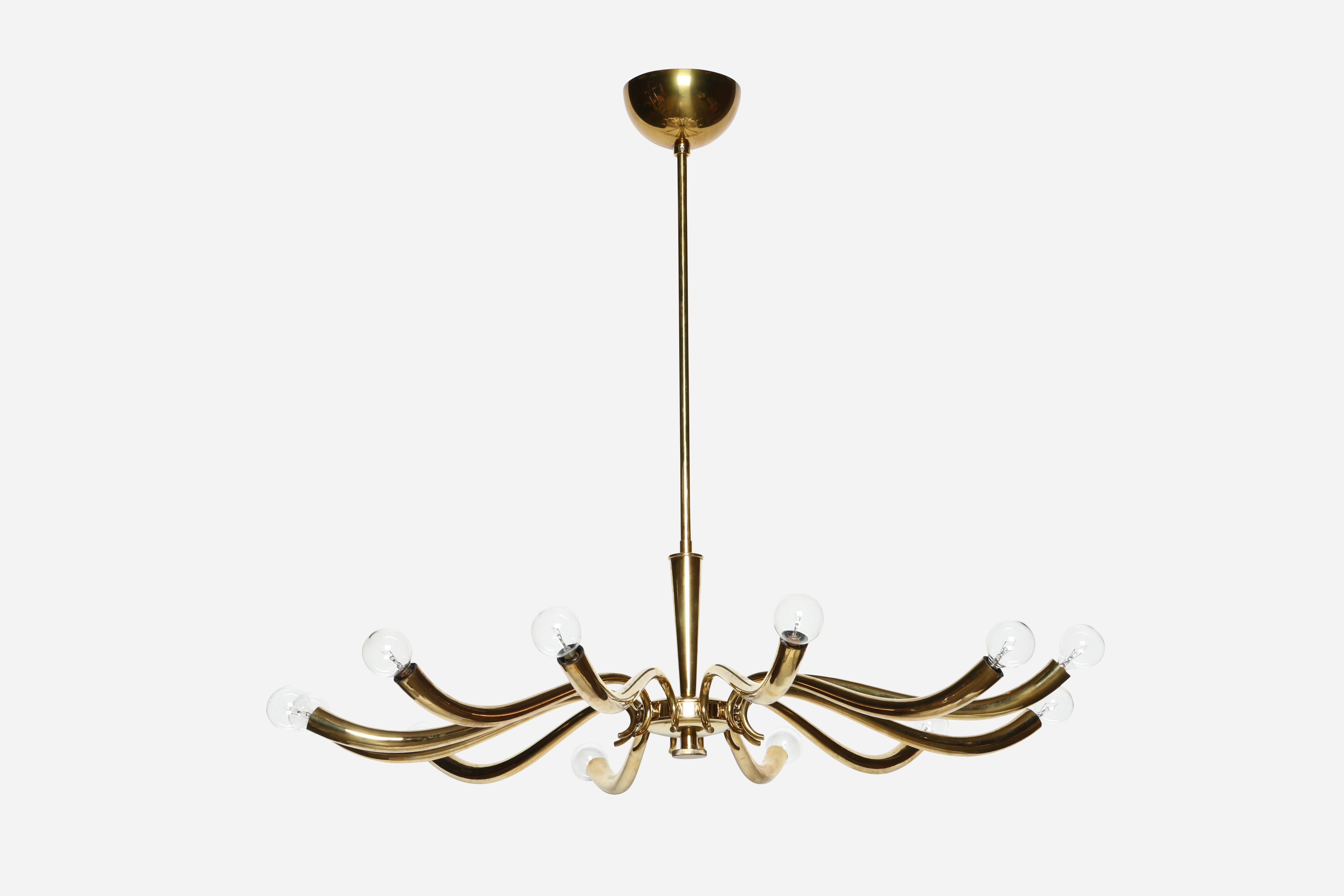 Oscar Torlasco attributed chandelier.
Polished brass.
12 arms with candelabra sockets.