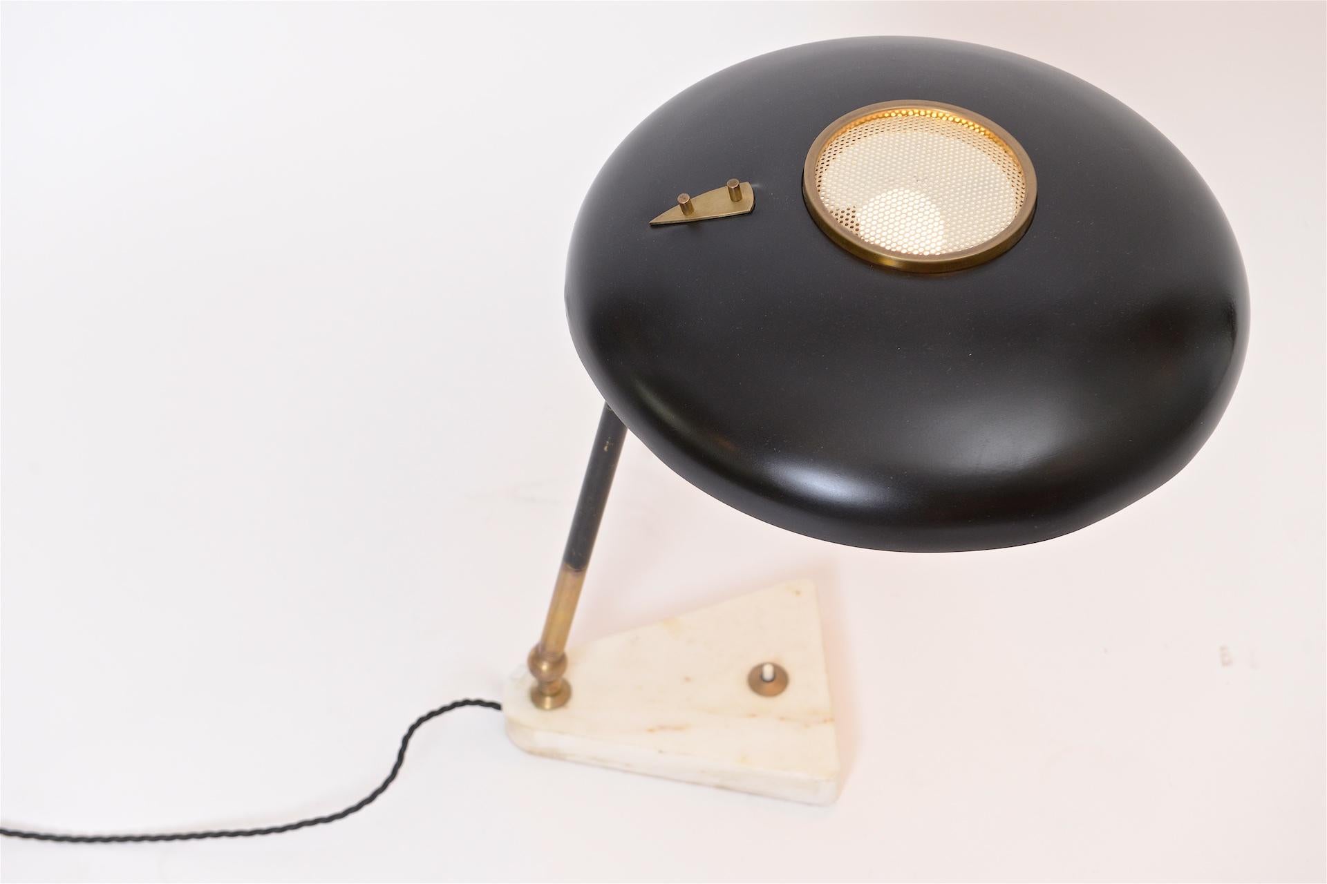Nice quality articulated Torlasco lamp with marble base

Rewired and pat tested.