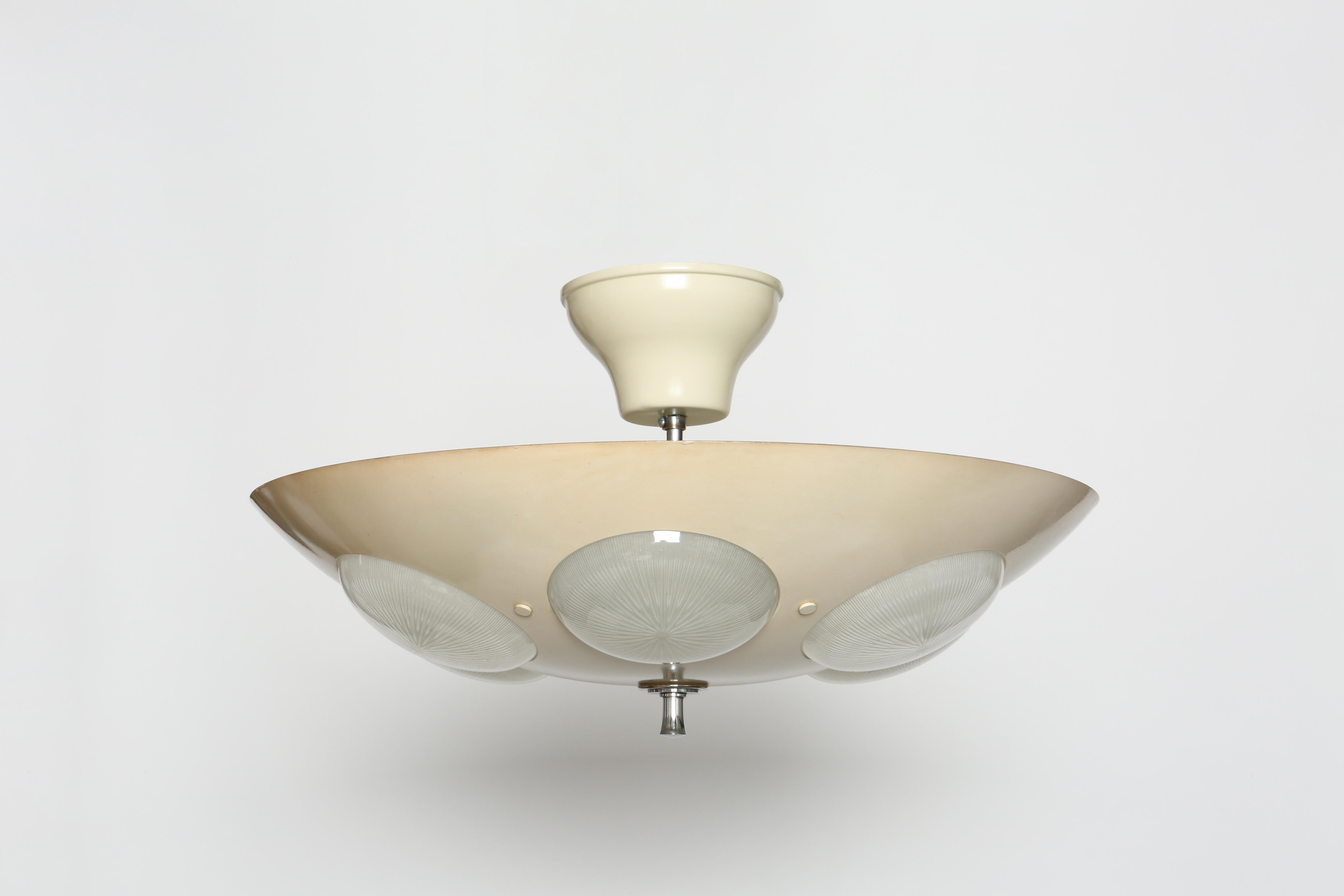 Oscar Torlasco for Lumi attributed.
Made in Italy in 1950s.
Impressive pendant made with enameled metal shade with 6 holophane glass diffusers.
4 medium base sockets.
Rewired for US.

 