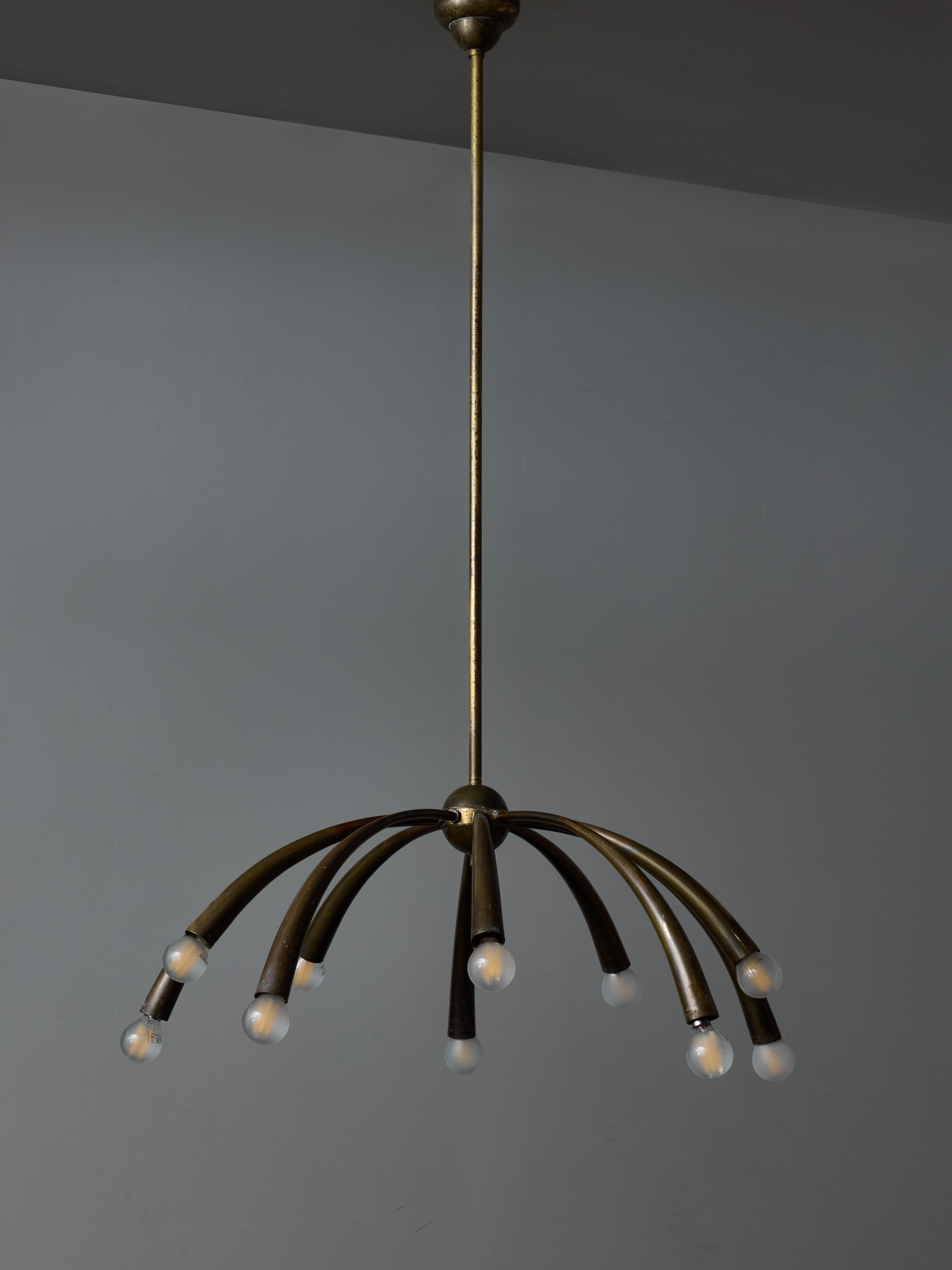 Mid-Century Modern Oscar Torlasco for Lumi Brass Chandelier with Ten Curved Arms of Light For Sale
