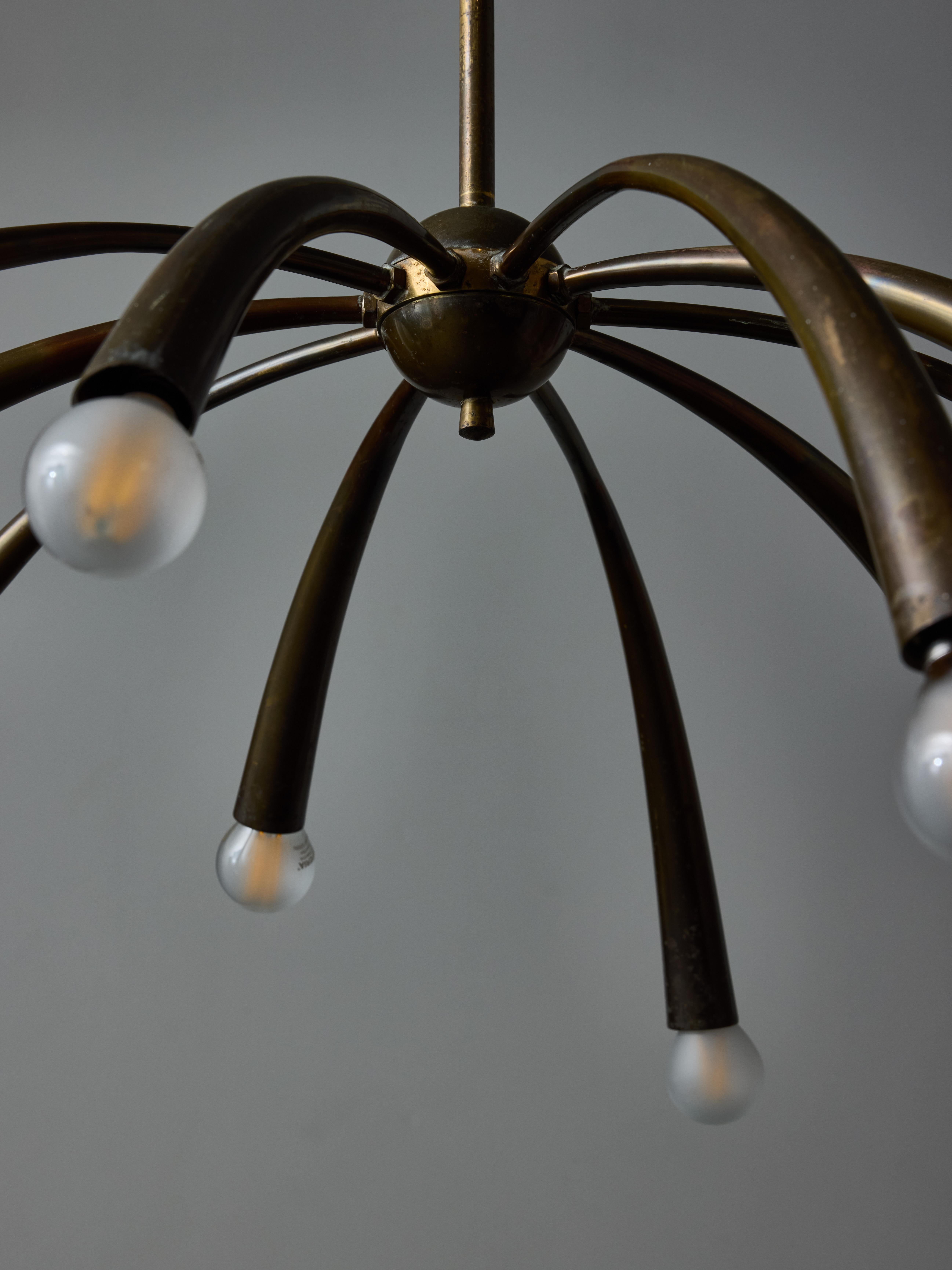 Italian Oscar Torlasco for Lumi Brass Chandelier with Ten Curved Arms of Light For Sale