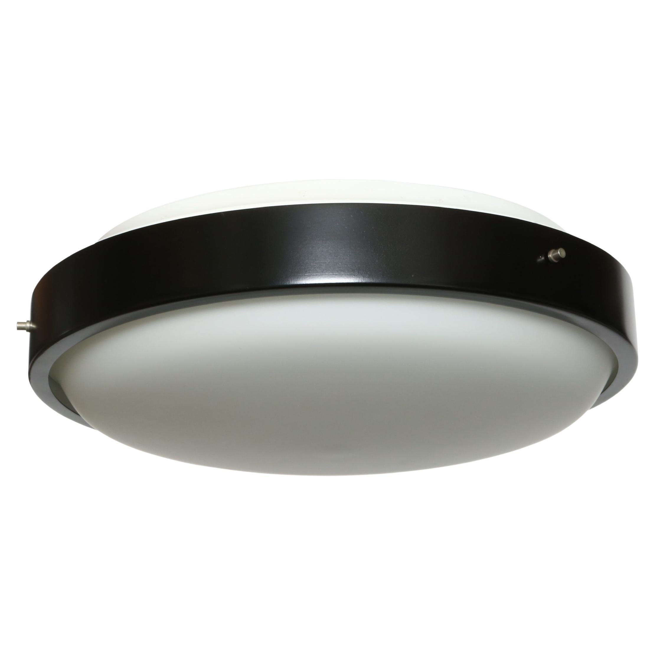 Oscar Torlasco for Lumi flush mount ceiling light.
Designed and manufactured in Italy, 1950s
