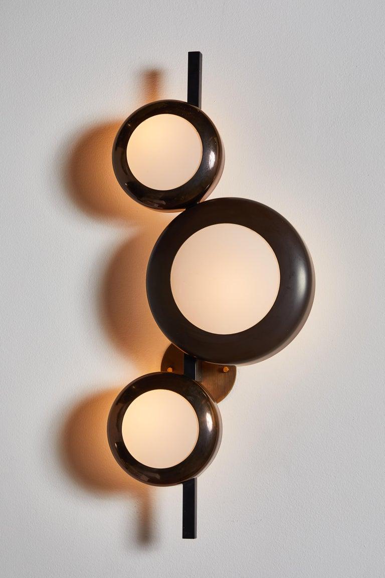 Oscar Torlasco for Lumi Italian Metal Opaque Glass and Brass Sconces, circa 1950 In Good Condition In Chicago, IL