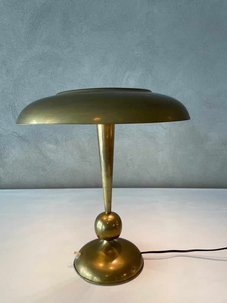 Mod. 143 table lamp designed by Oscar Torlasco, manufactured by Lumi Italy, 1960s.
Brass, frosted glass with triple light bulbs.
Excellent vintage patina.

References: Giuliana Gramigna, “Repertorio 1950/1980”, Mondadori, 2001; p. 355
 
Oscar