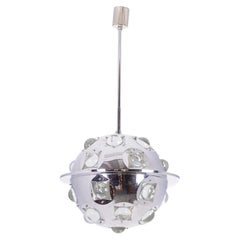 Oscar Torlasco. “Satellite” chandelier in chrome metal. 1970s.