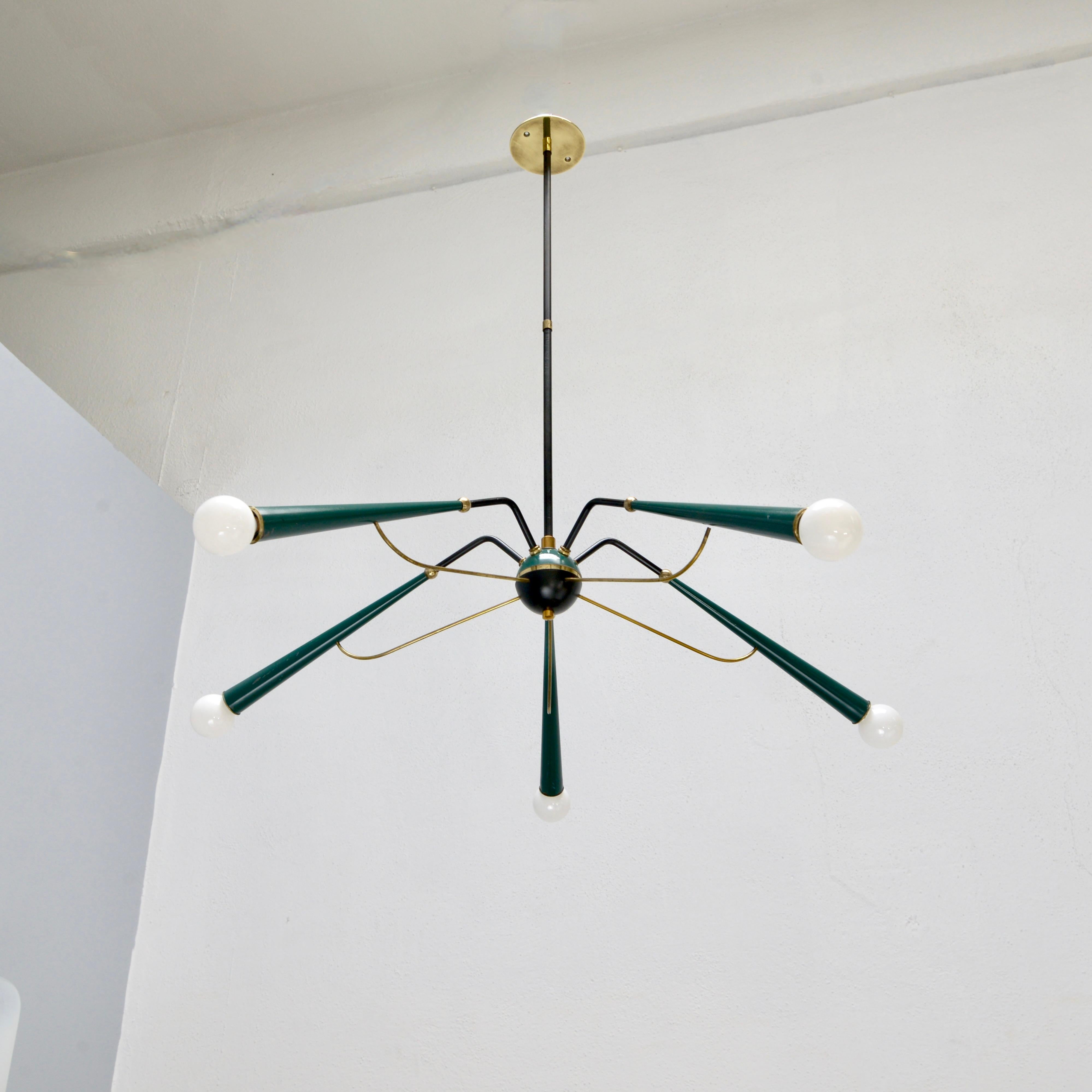 A wonderful 1950s Oscar Torlasco Sputnik chandelier from Italy, with original green paint. Partially restored and rewired with 5 E12 candelabra based sockets. For use in the US. Light bulbs included with order. 
Measurements:
OAD: 32” can be
