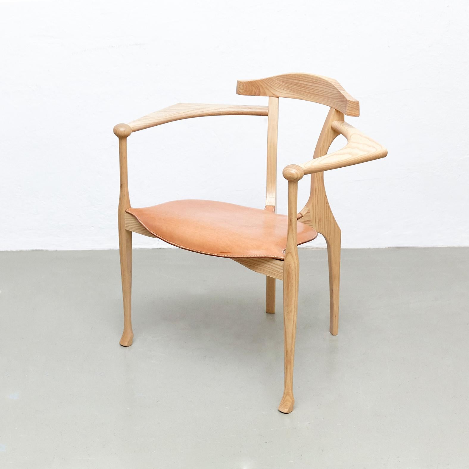 Gaulino armchair prototype designed by Oscar Tusquets manufactured by BD barcelona design, circa 2010.

Structure and back in wood, seat with upholstered in leather.

In good original condition, with minor wear consistent with age and use,