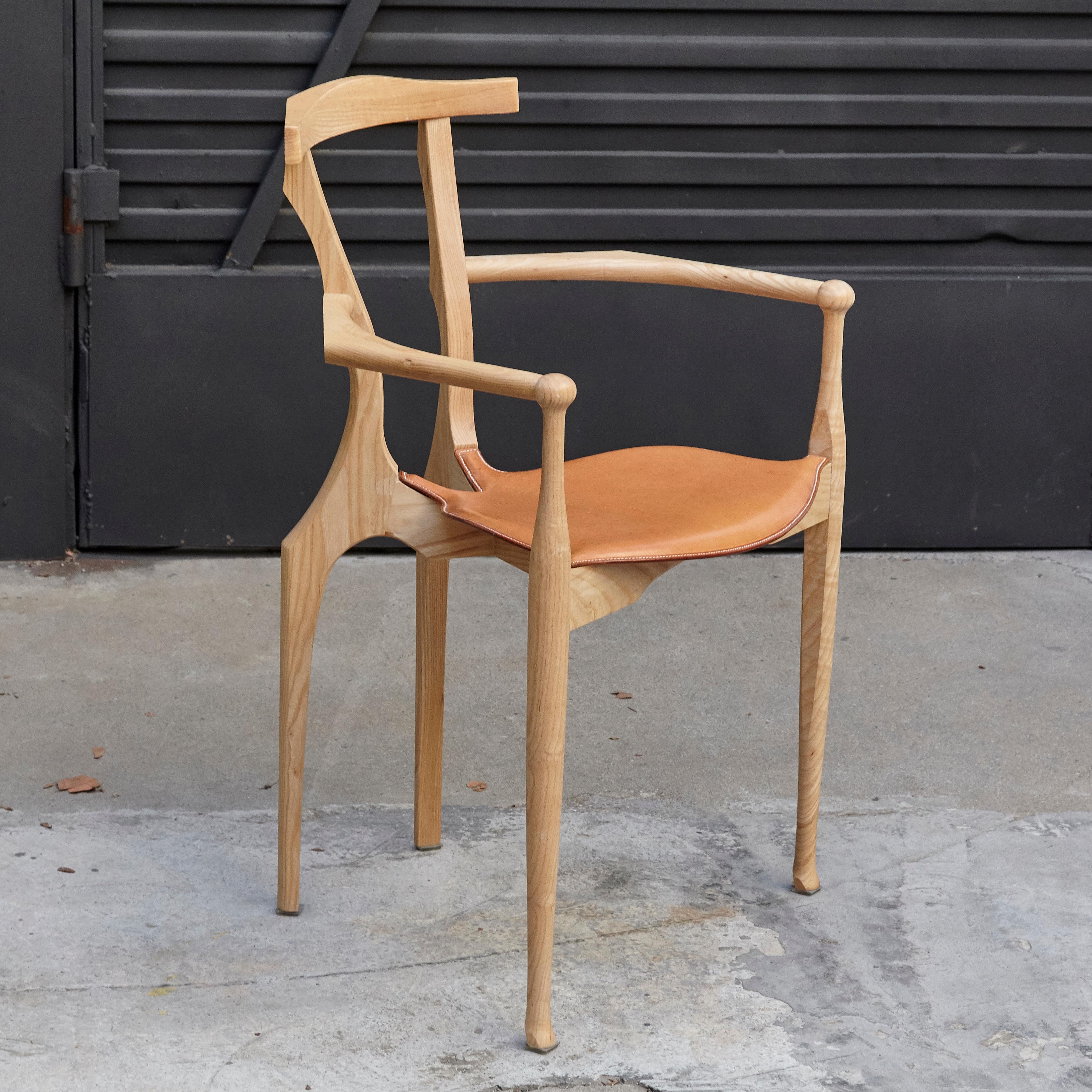 Gaulino chair designed by Oscar tusquets manufactured by BD Barcelona.

Solid natural varnished ash with seat in natural hide.