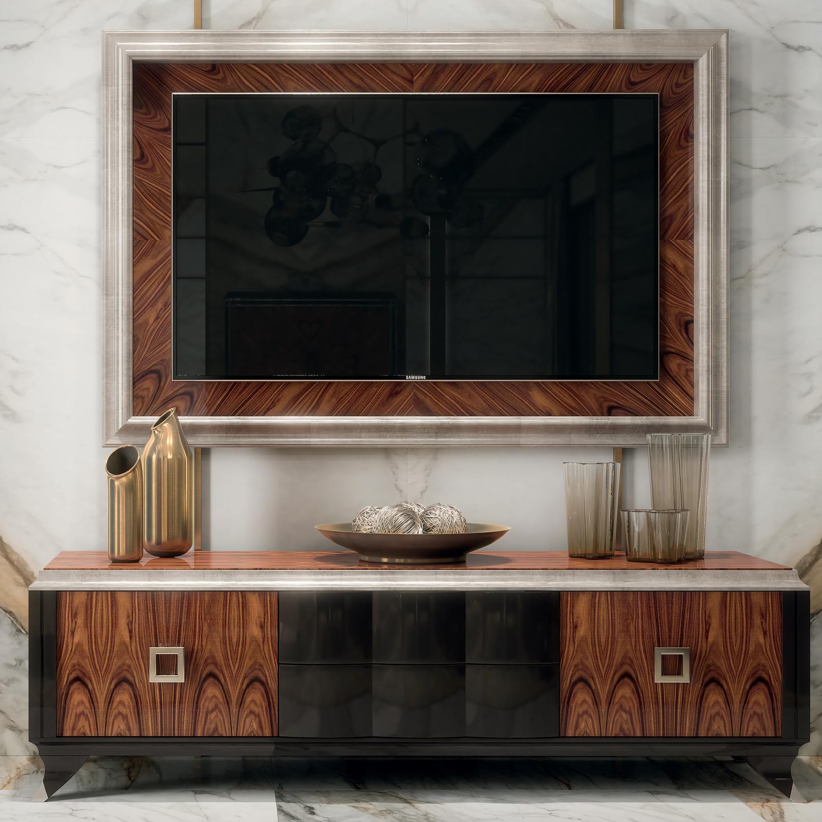 A luxurious part of the new Oscar collection, this TV cabinet with 2 doors and 2 drawers featuring push pull blumotion, boasts a captivating design with elements of Santos rosewood that will adapt to any setting with a contemporary, cosmopolitan