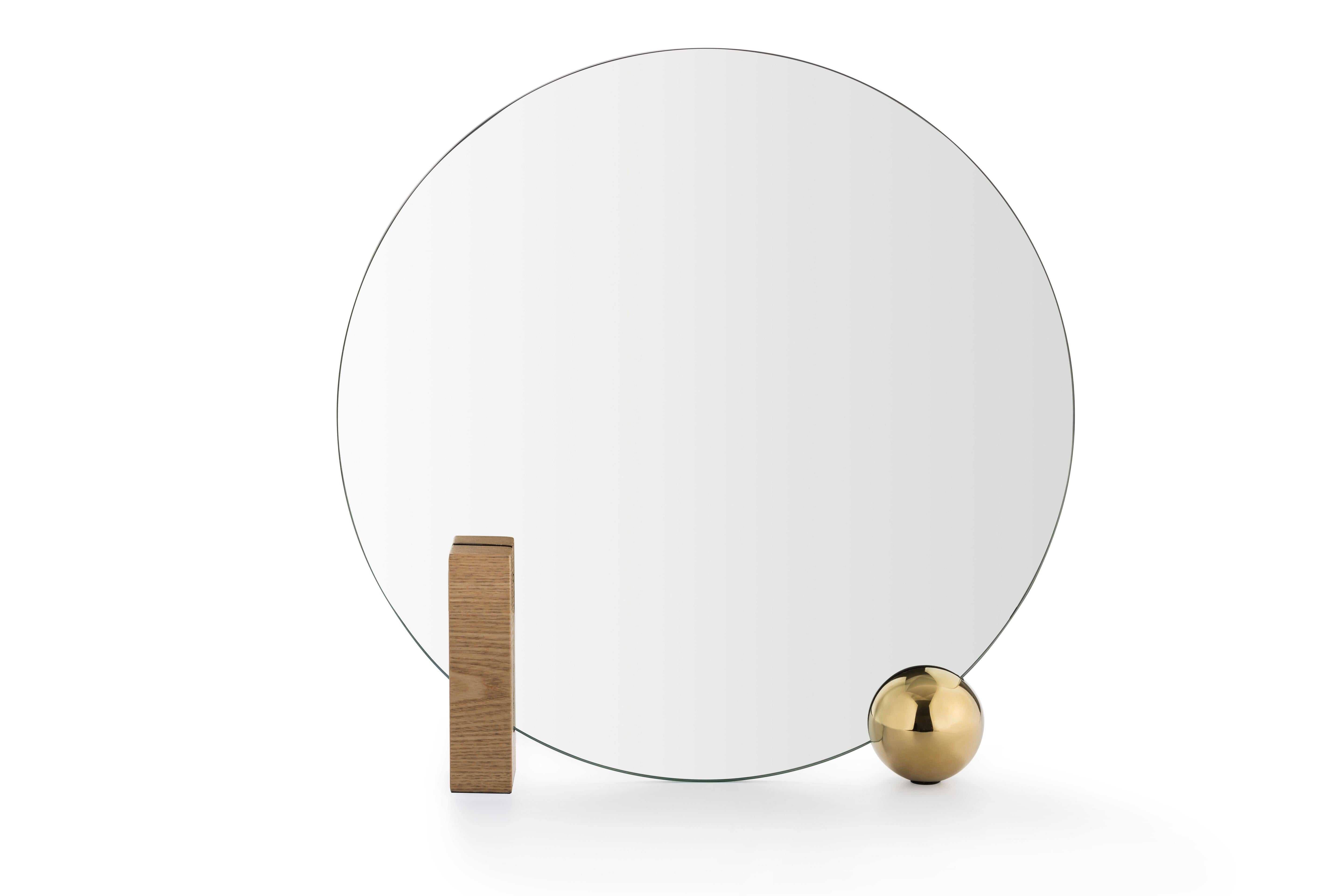 Design by WUU
Table mirror Measures: W 50 x D 9 x H 50 cm
Rectangular block in ash veneer painted metal or green marble
Round ball – plated metal coated with glossy gold finish
Back mirror in colored-stained ash veneer, celadon color
Clear