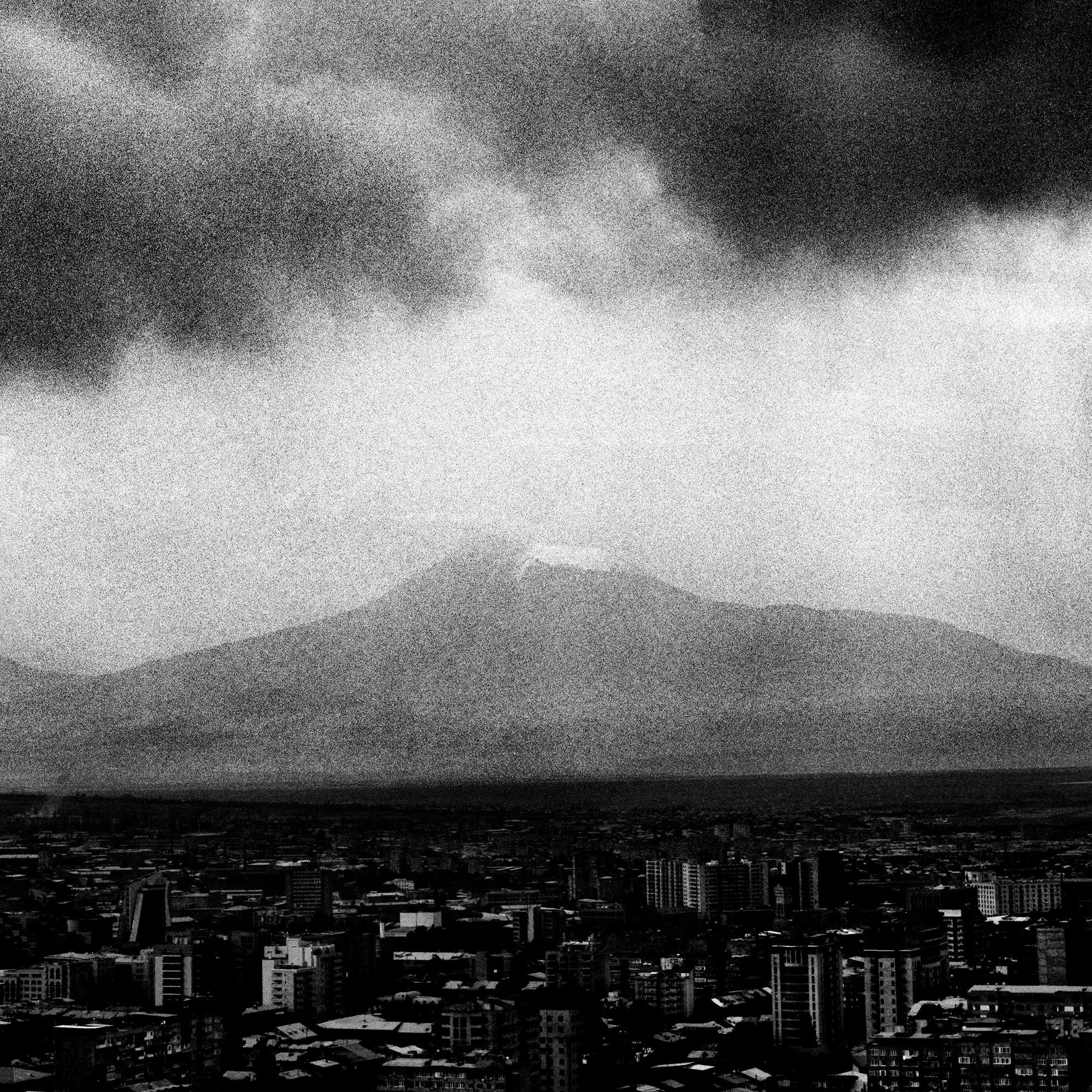 Storm Over Yerevan, contemporary photo, cityscape, climate, black and white - Photograph by Osheen Harruthoonyan