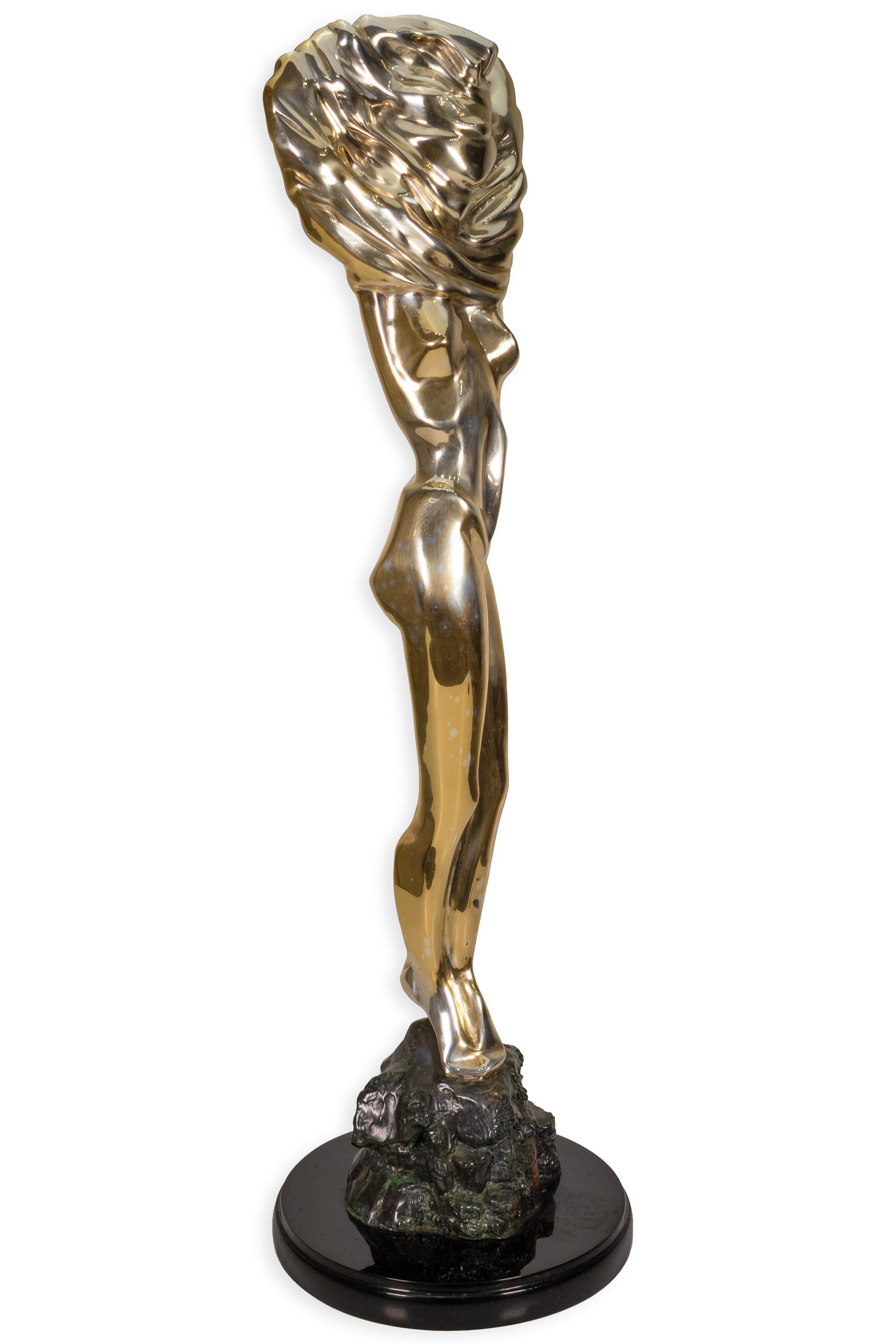 A contemporary figurative silver-plated sculpture titled 