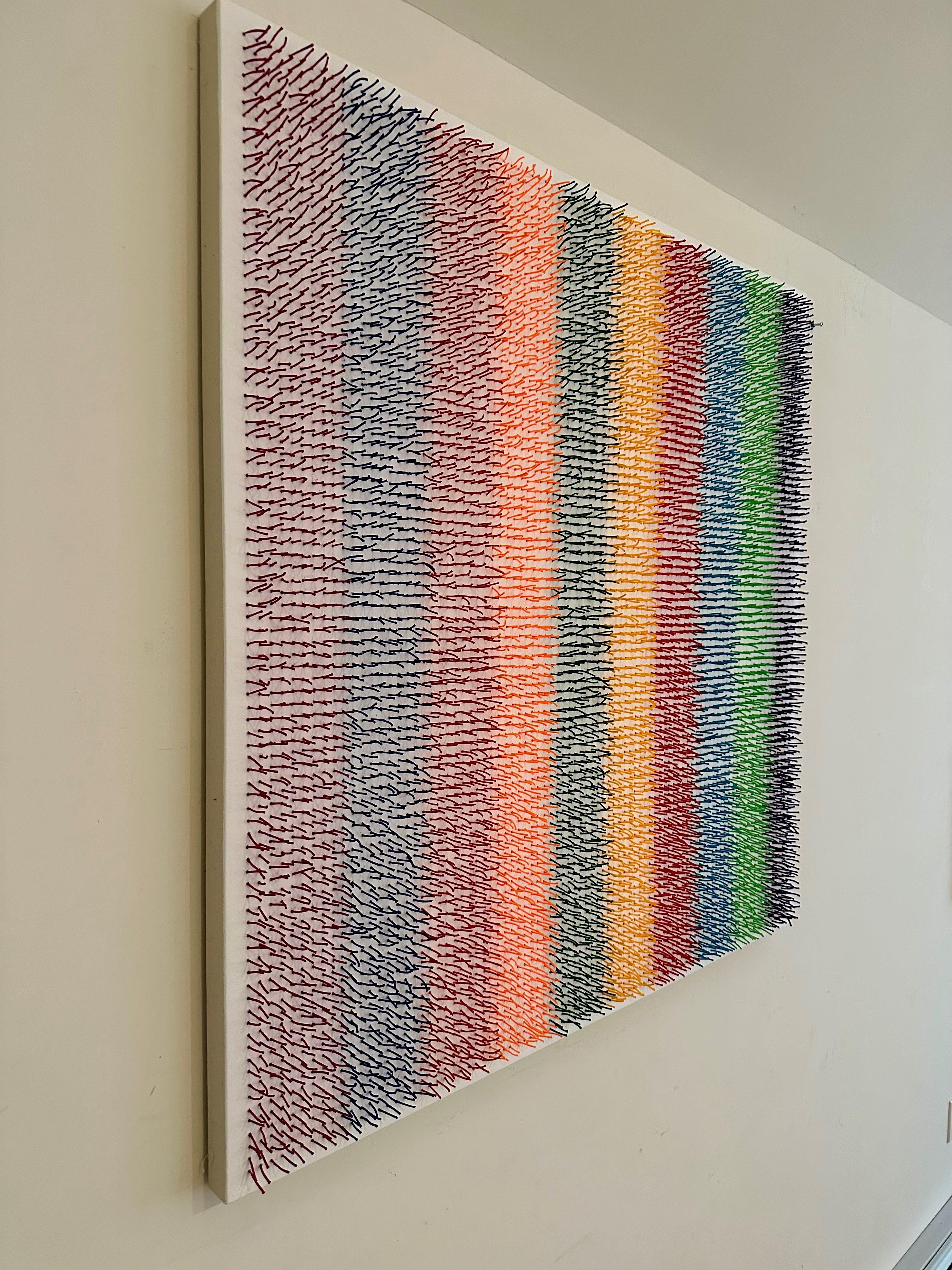 Abstract, sculptural, colorful artwork with strands of yarn piercing canvas For Sale 2