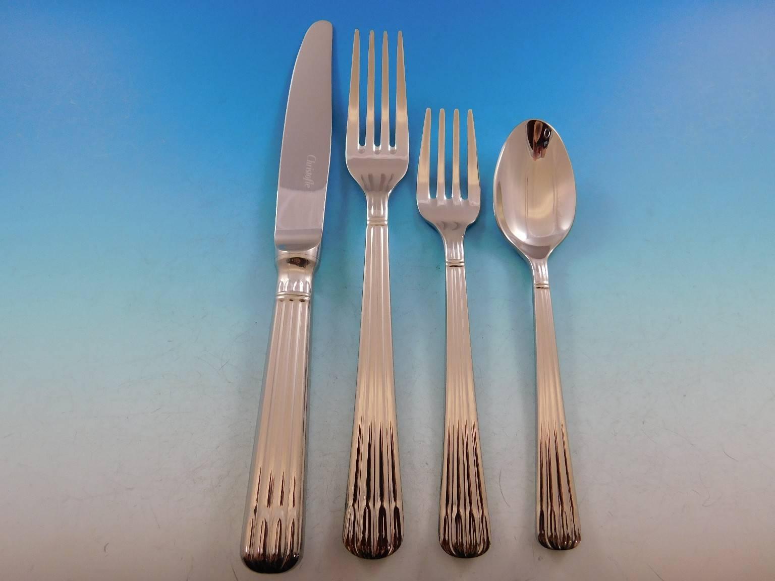 Osiris by Christofle France stainless steel, new

This new Osiris stainless steel flatware set includes:

12 dinner knives, 9 1/8