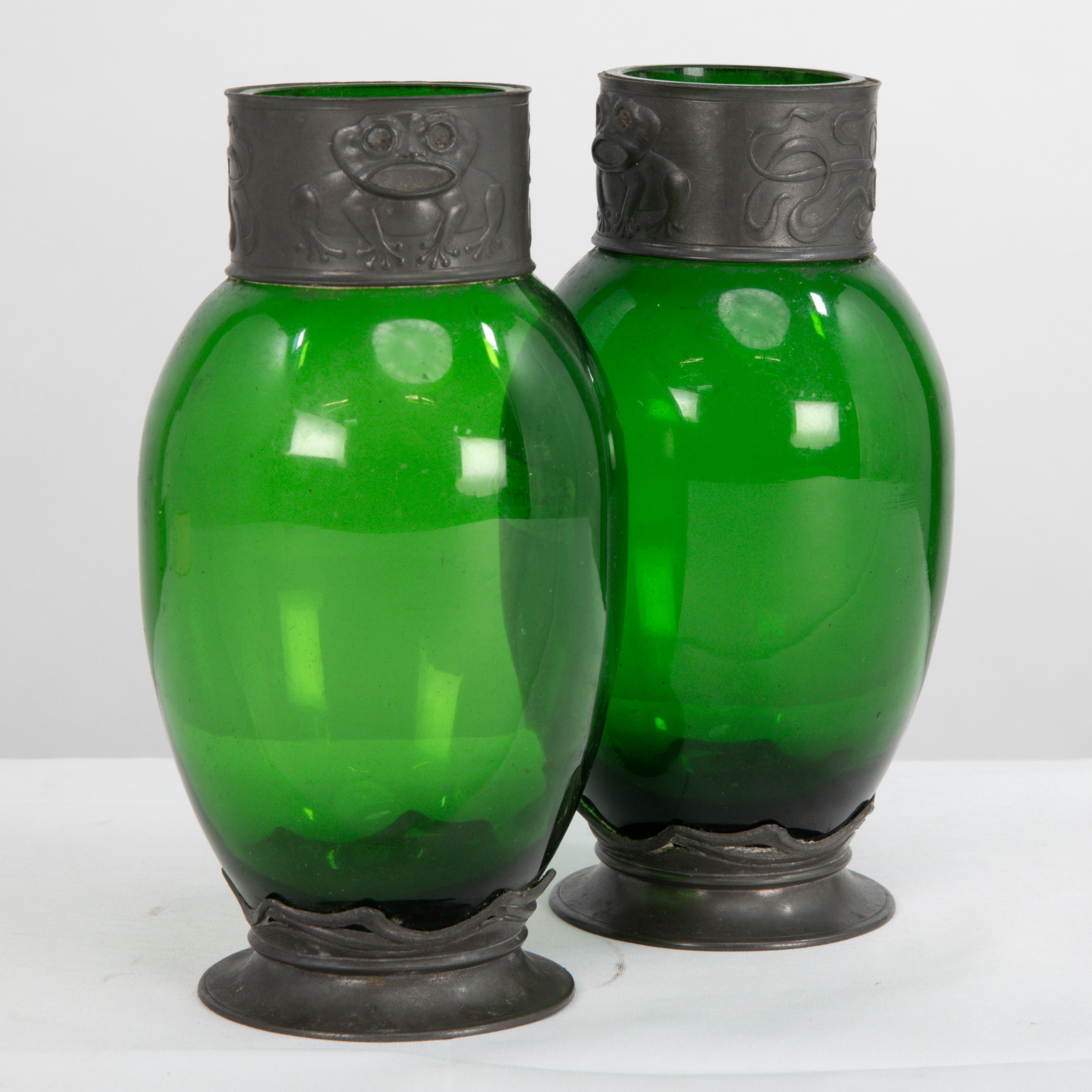 English Osiris Pewter. A pair of Art Nouveau pewter & green glass vases with frog decor For Sale