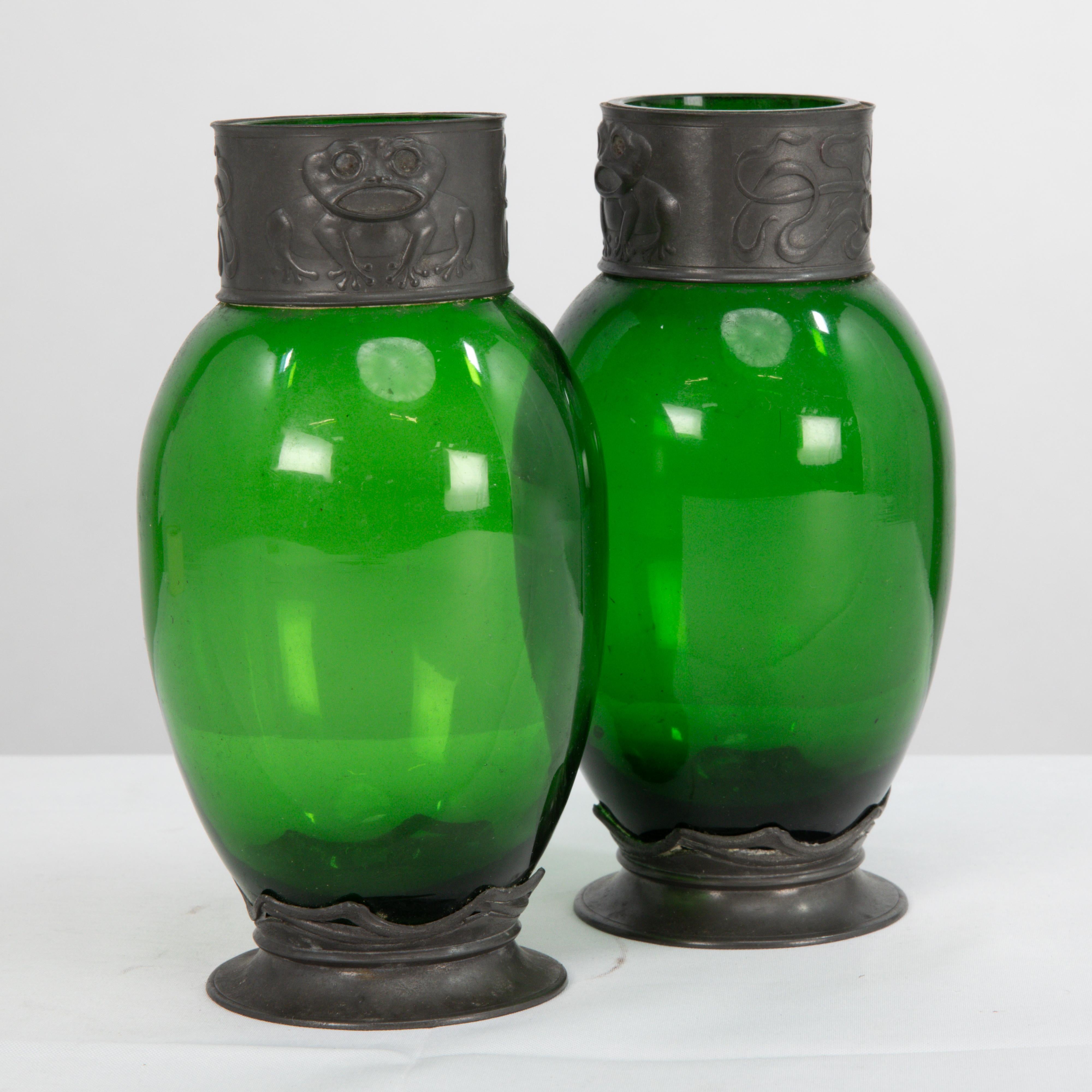 Early 20th Century Osiris Pewter. A pair of Art Nouveau pewter & green glass vases with frog decor For Sale