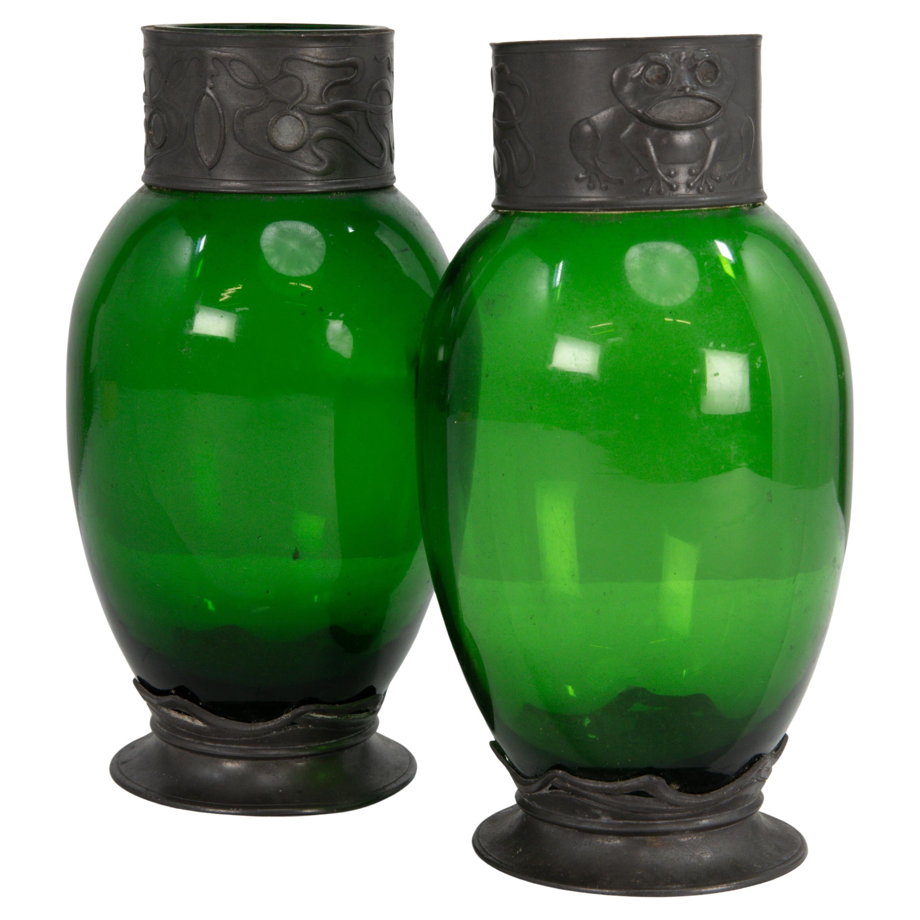 Osiris Pewter. A pair of Art Nouveau pewter & green glass vases with frog decor