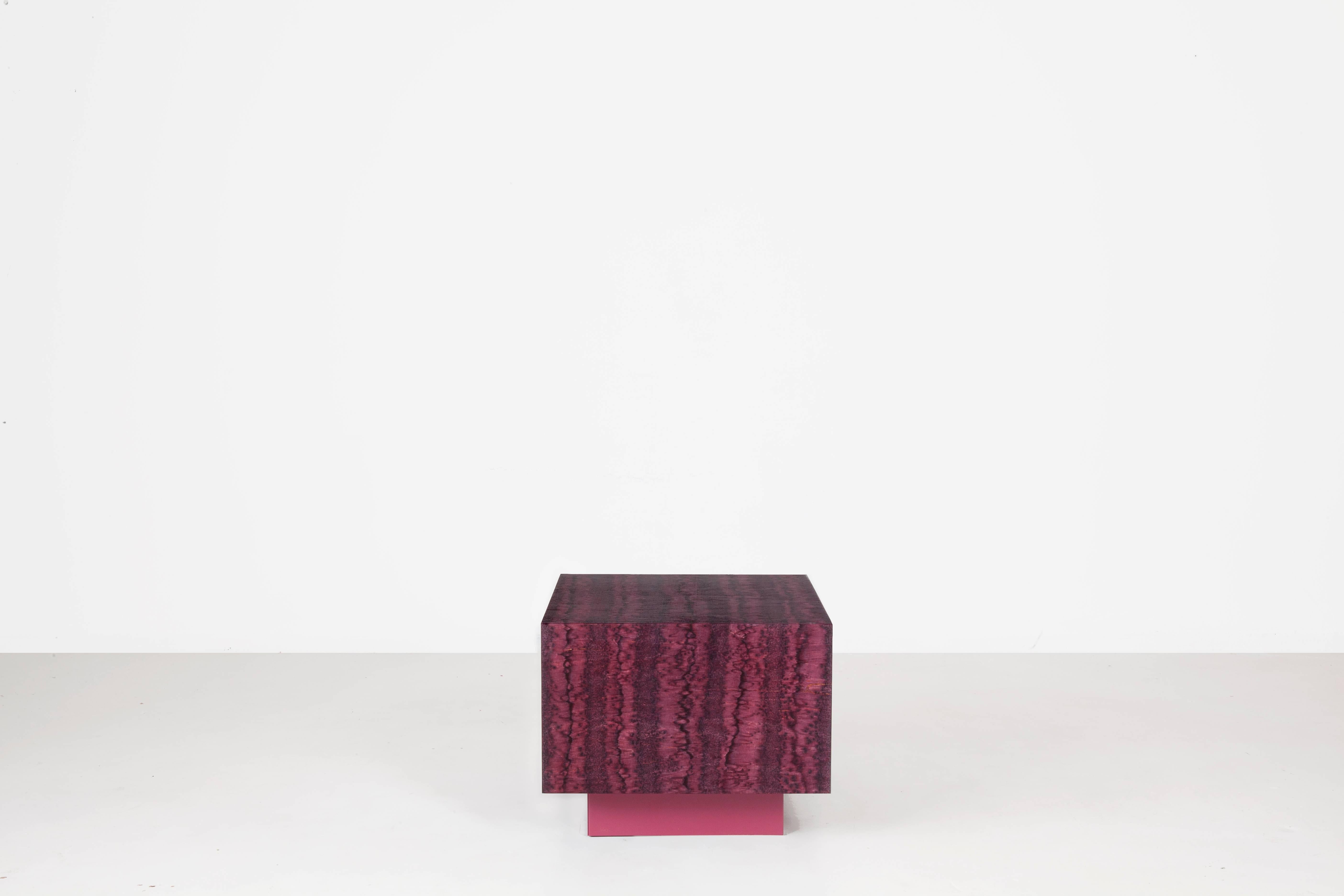 The cube table is part of the first Osis furniture edition. The production started in 2017. Osis table tops are made of salt-treated birch, with the base being made of powder-coated steel. This is the red striped version. The surface finish Osis is