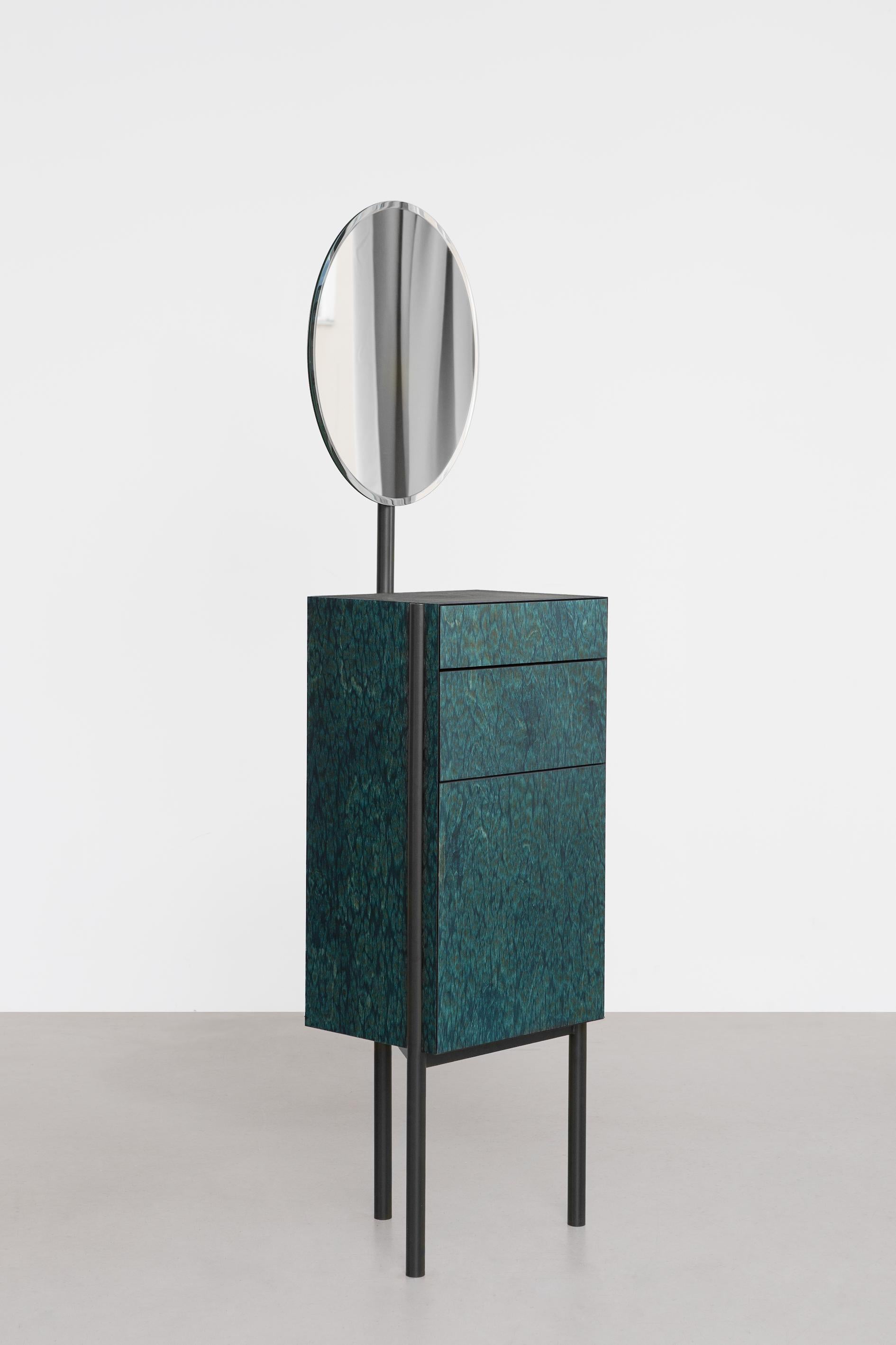 Osis Karla mirror / side table by Llot Llov
Dimensions: H 170 x W 43 x D 30 cm
Materials: birch
Finishing: lacquered / powder-coated steel

KARLA s a piece of furniture that is as lovely as its task. It functions as a dressing and make-up