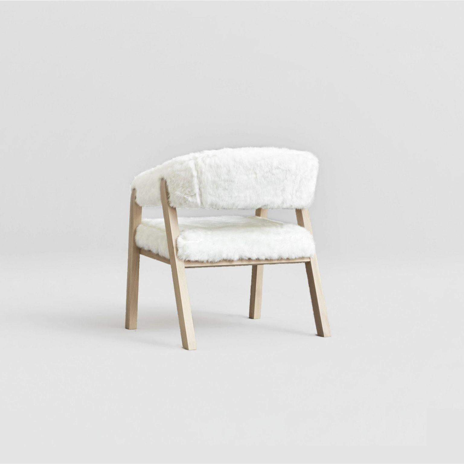 Oslo armchair - arctic fox throw by Pepe Albargues
Dimensions: W65, D60, H73, Seat 44
Materials: Beech wood structure.
Foam CMHR (high resilience and flame retardant) for all our cushion filling systems

Also available: Variations of materials